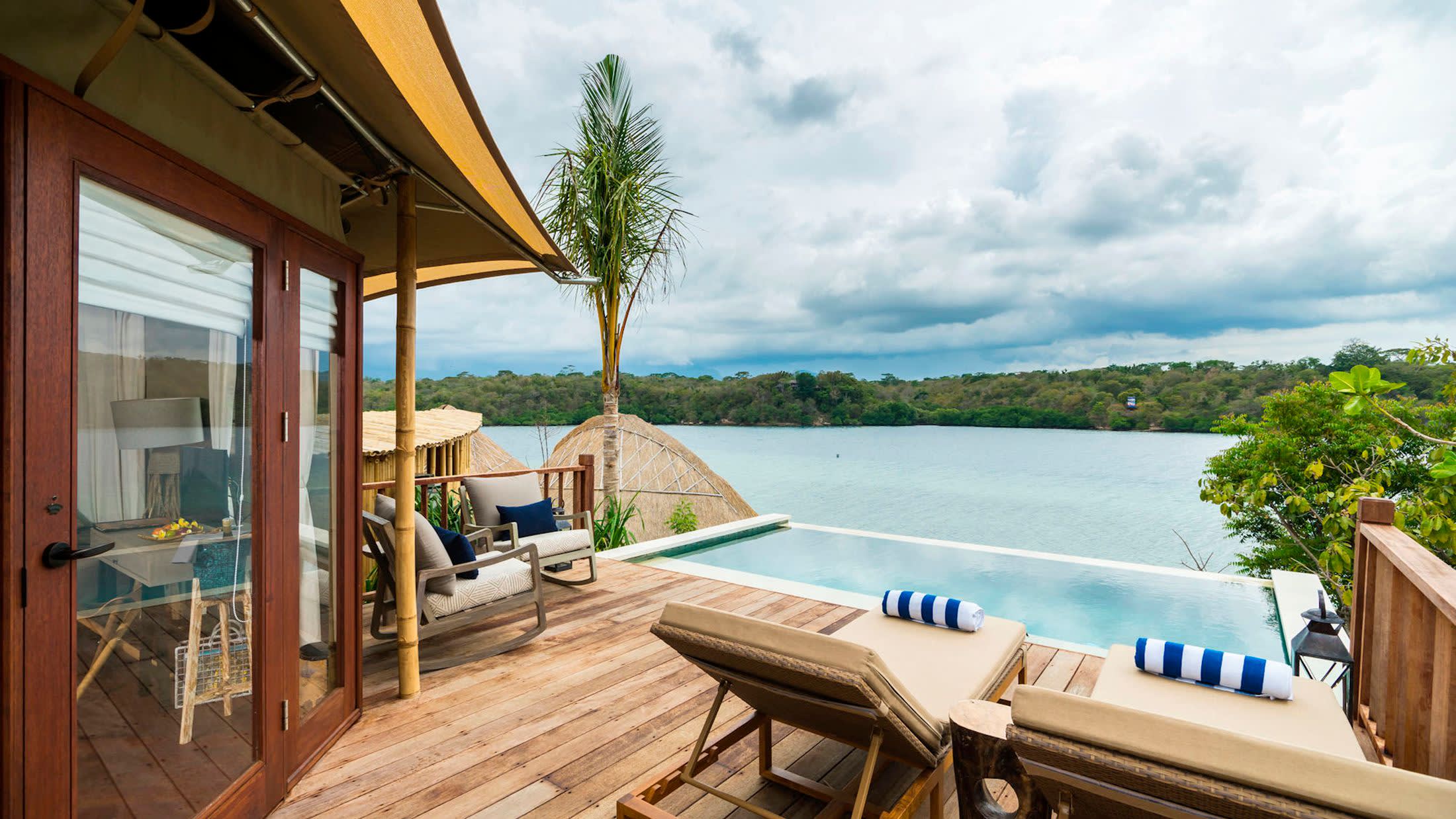 a bench in front of a body of water