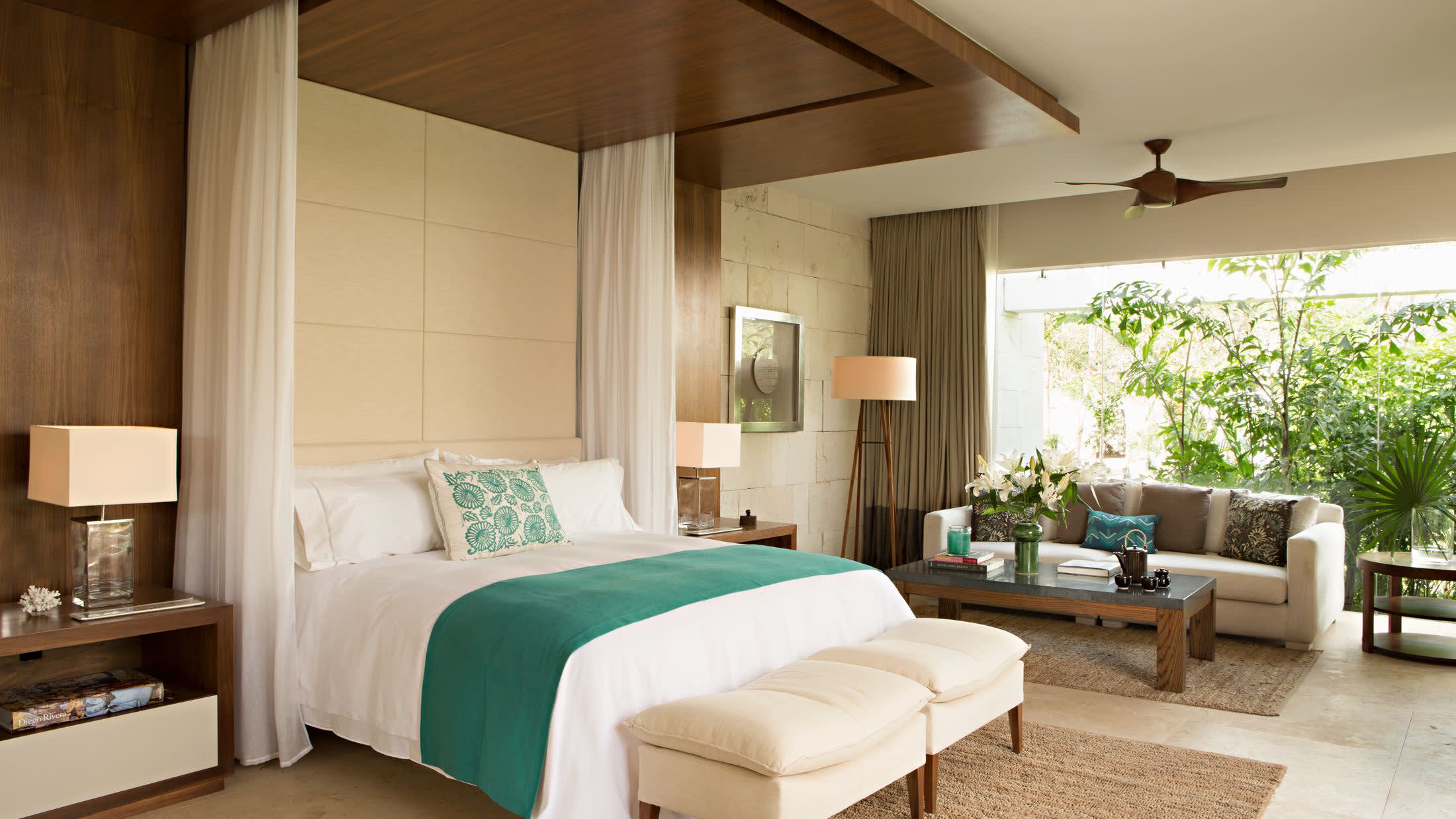 a bedroom with a large bed in a hotel room