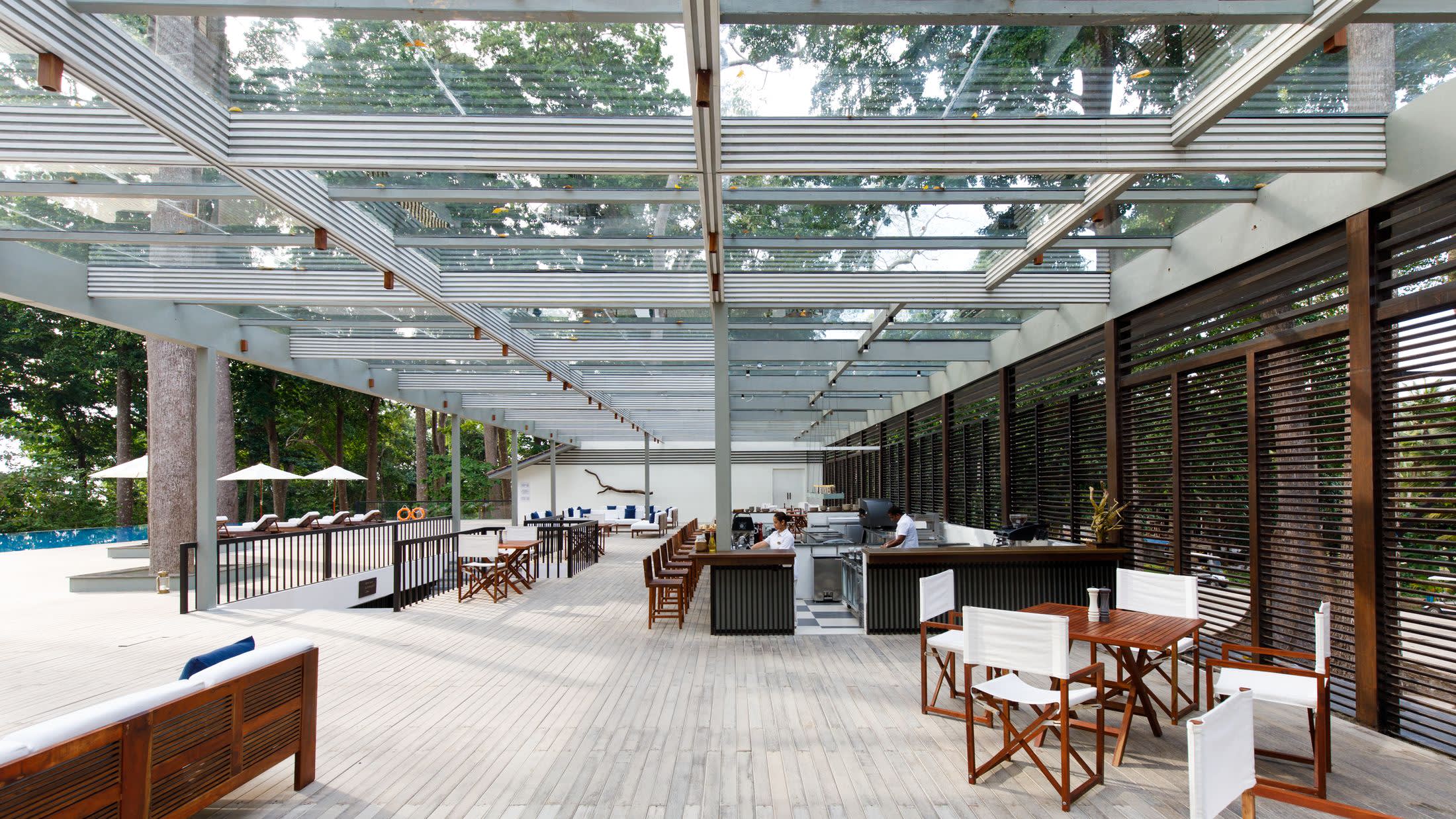 a room filled with furniture and a fence