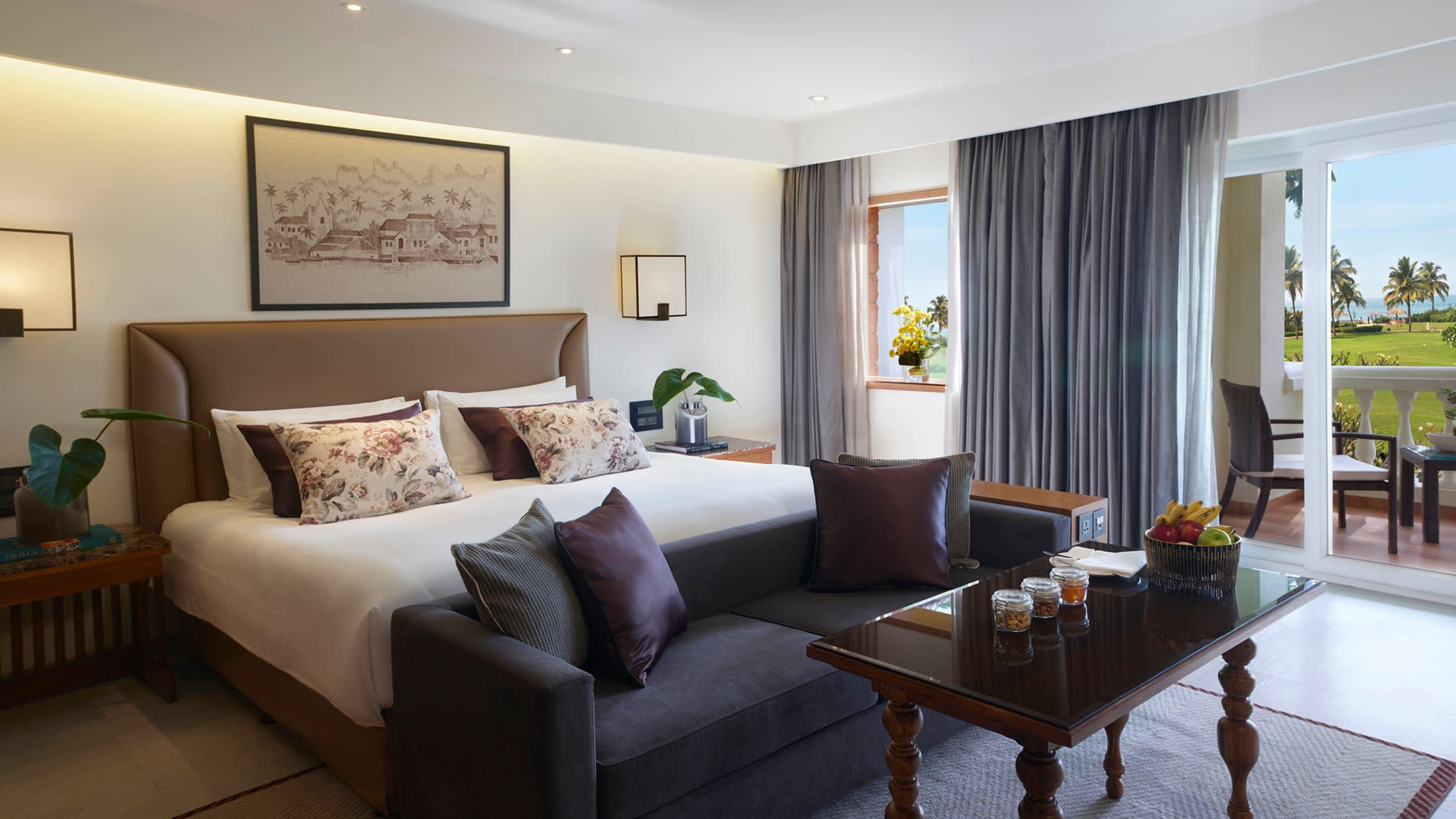 a living room filled with furniture and a flat screen tv