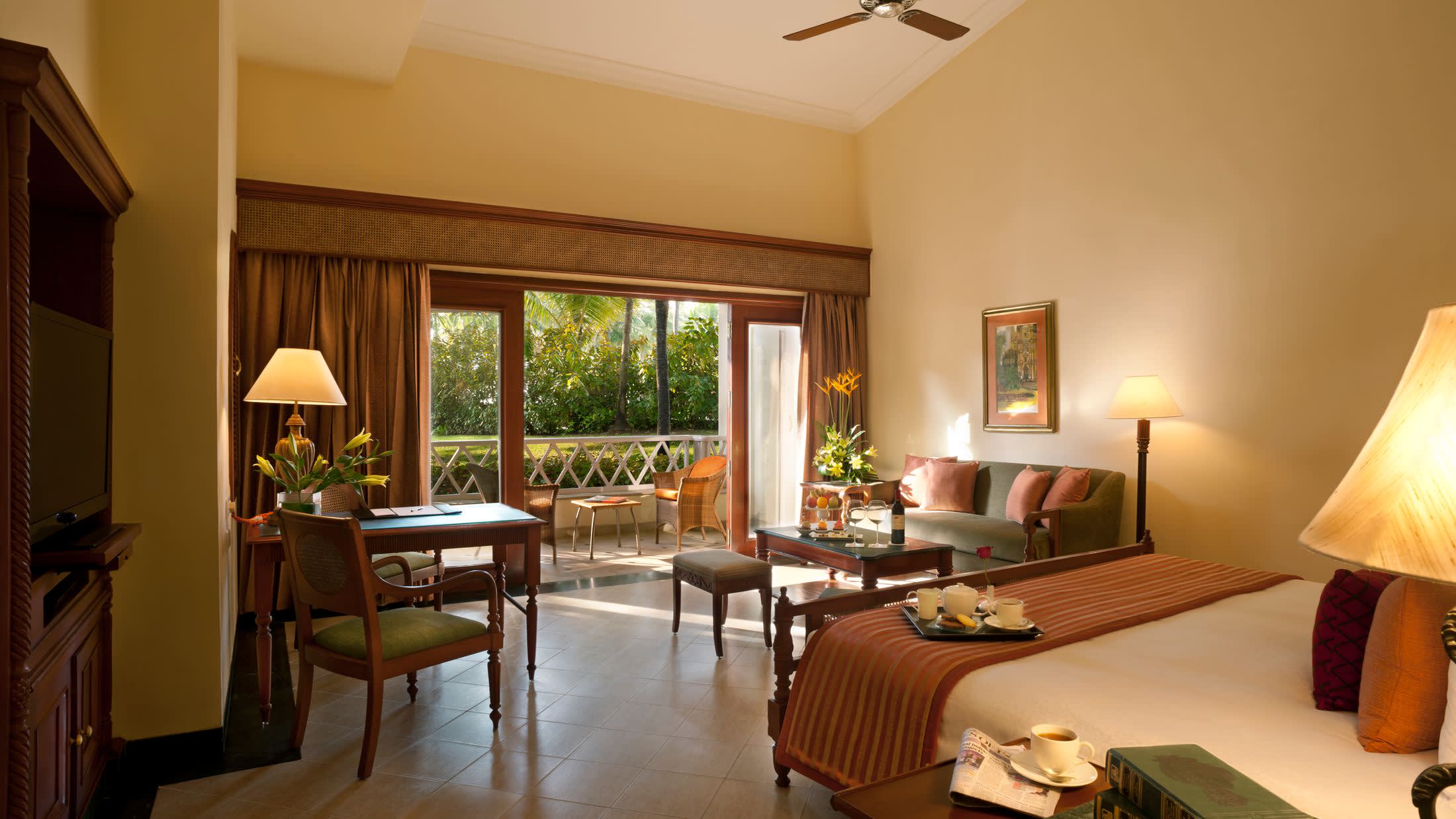 a living room filled with furniture and a large window