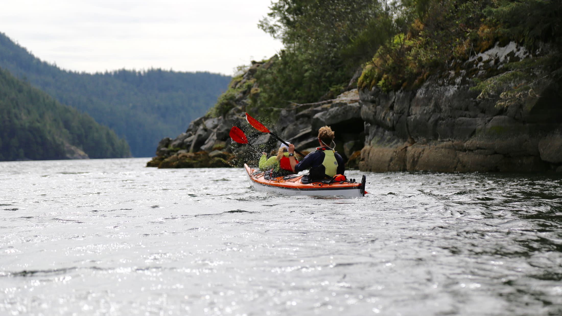 a small boat in a body of water
