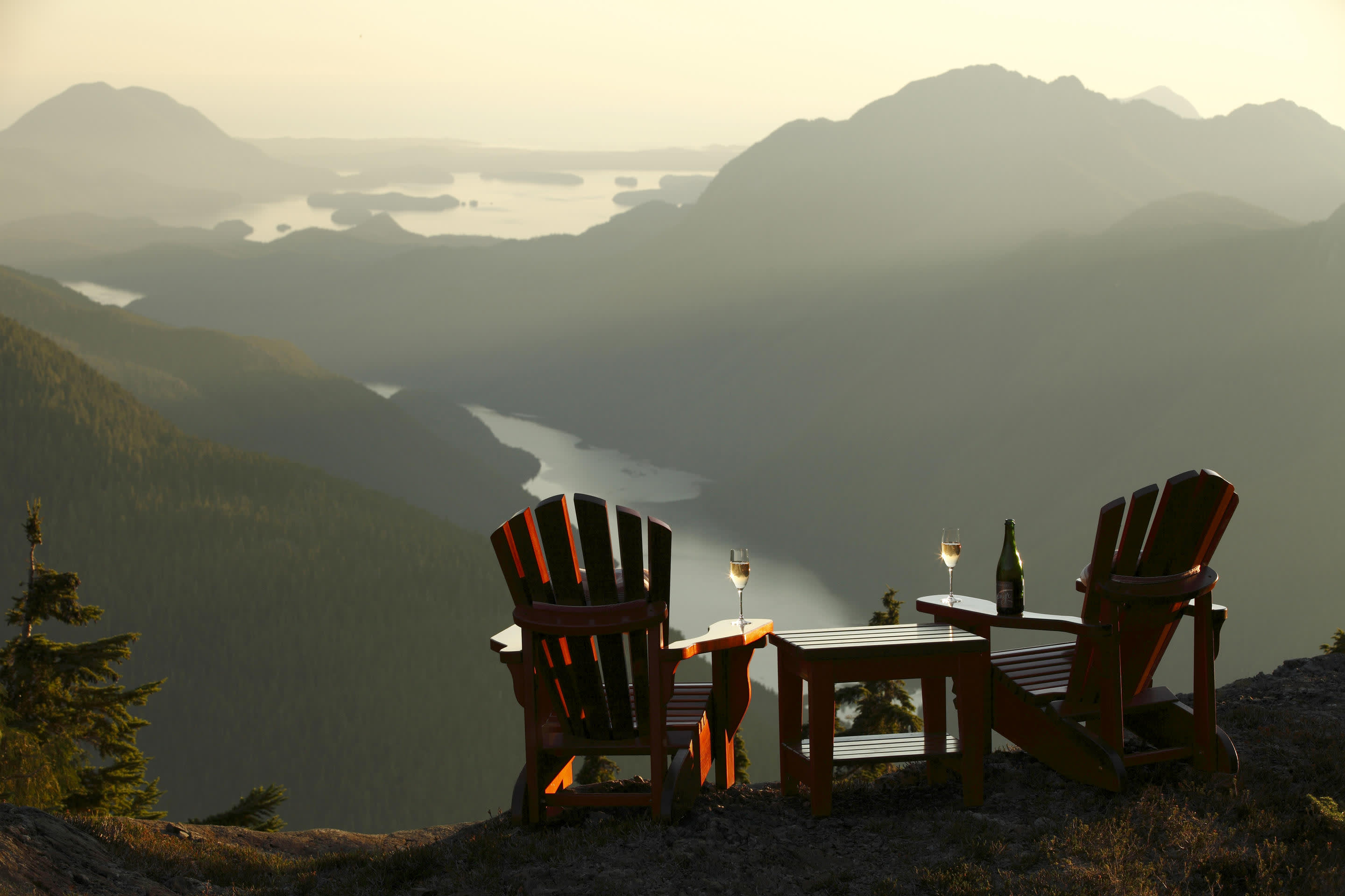 a chair sitting in front of a mountain
