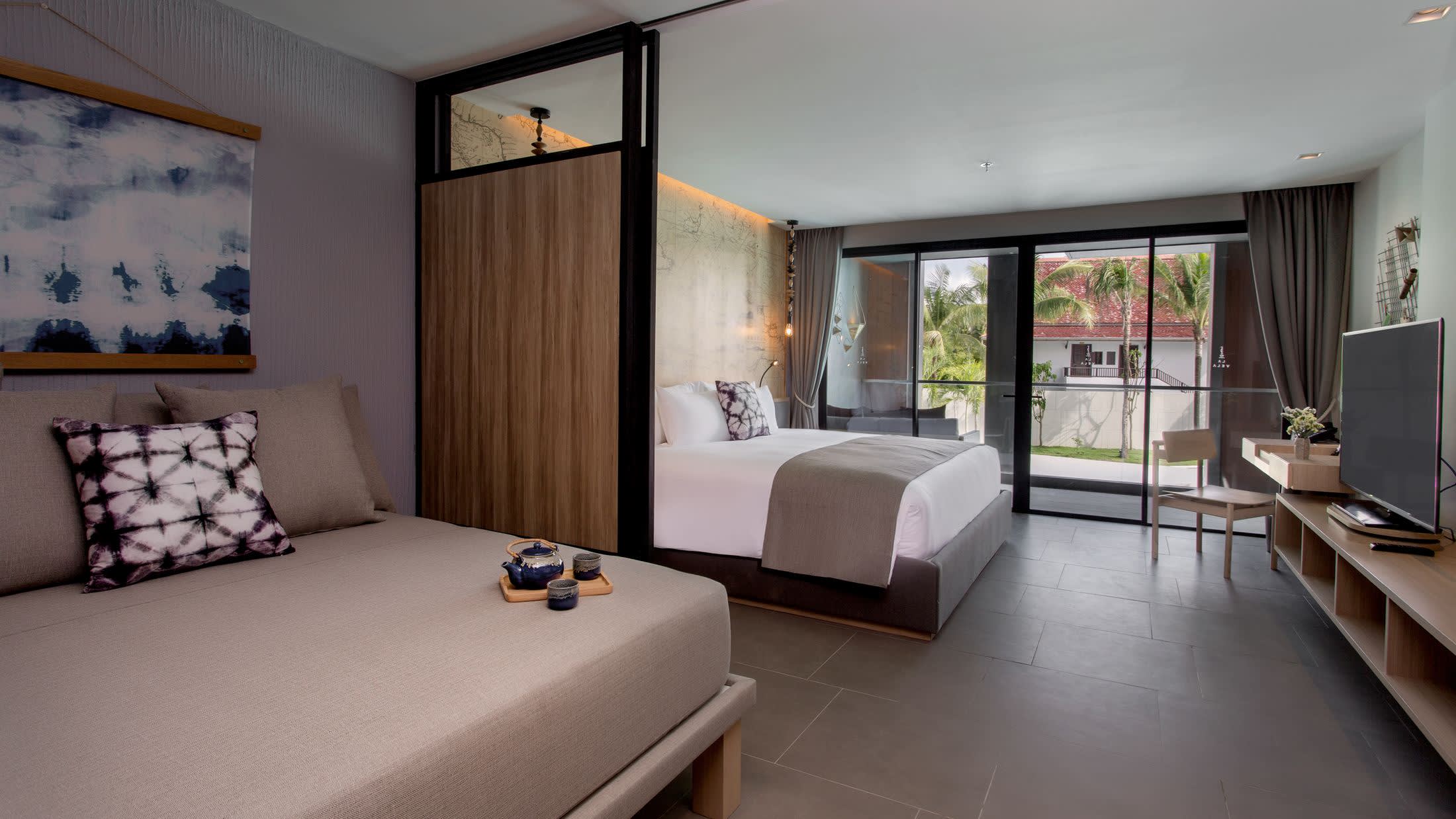 a bedroom with a large bed in a room