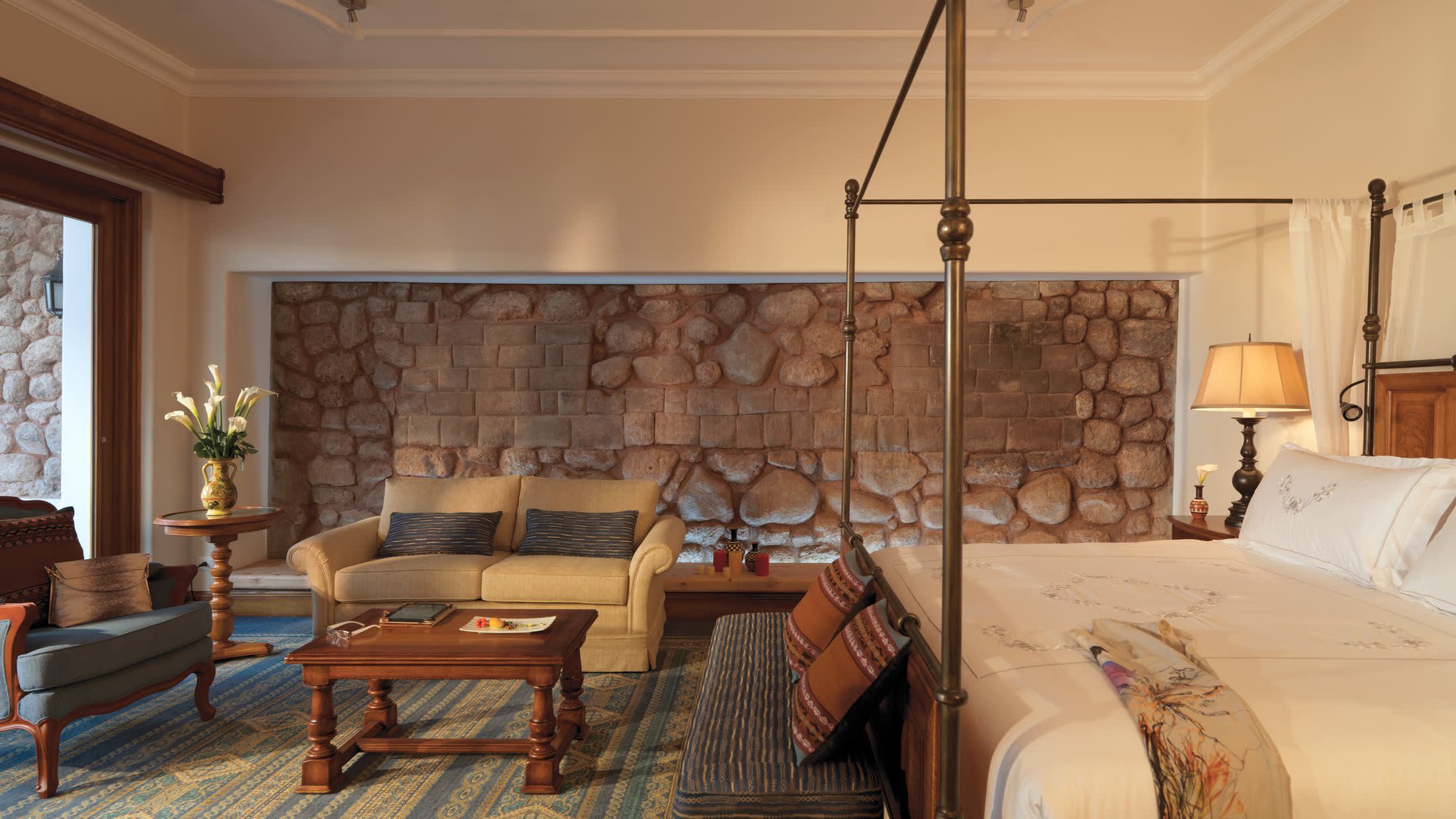 a living room filled with furniture and a fire place