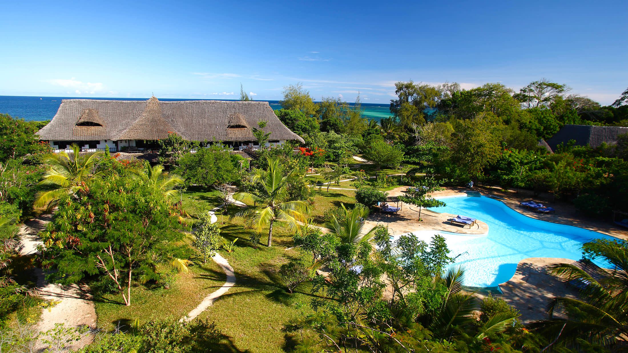 a close up of a hillside next to a building
