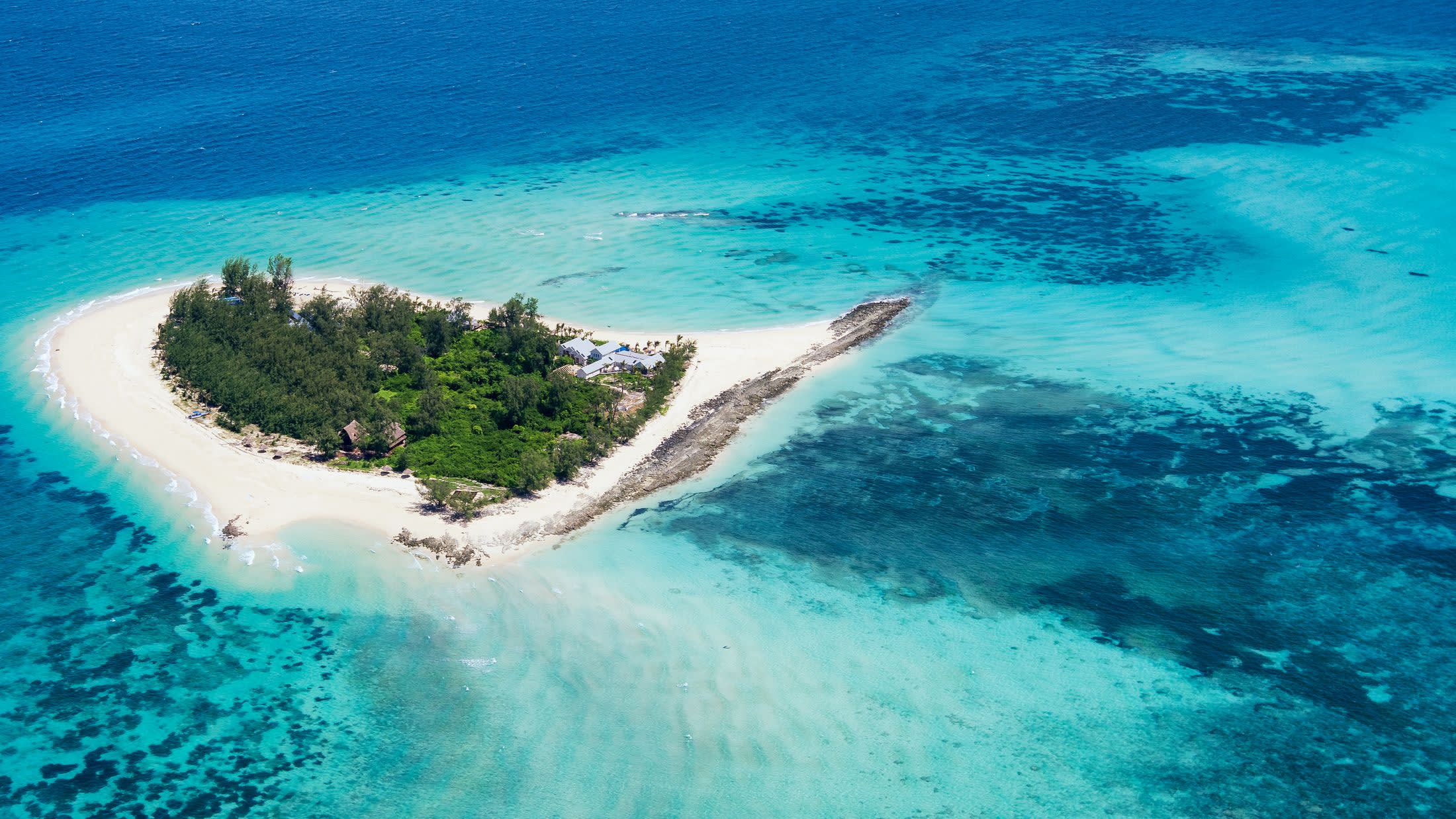 a pool next to a body of water