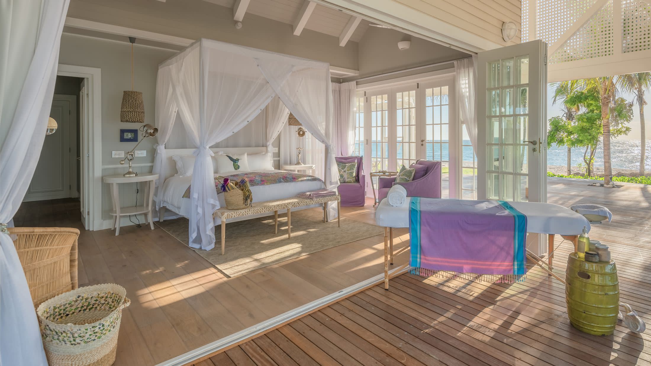 a living room filled with furniture and a large window