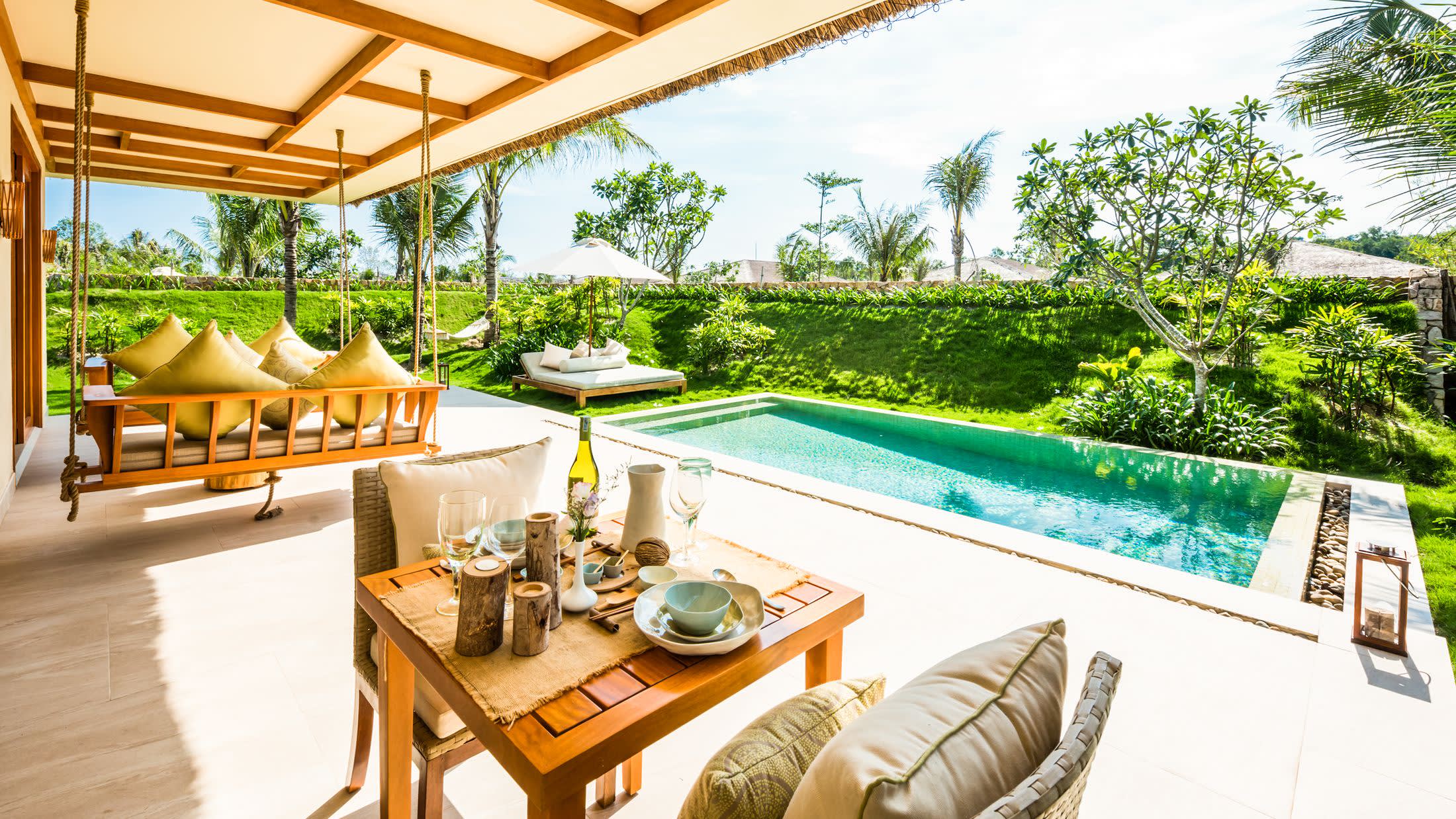 a dining room table in front of a building