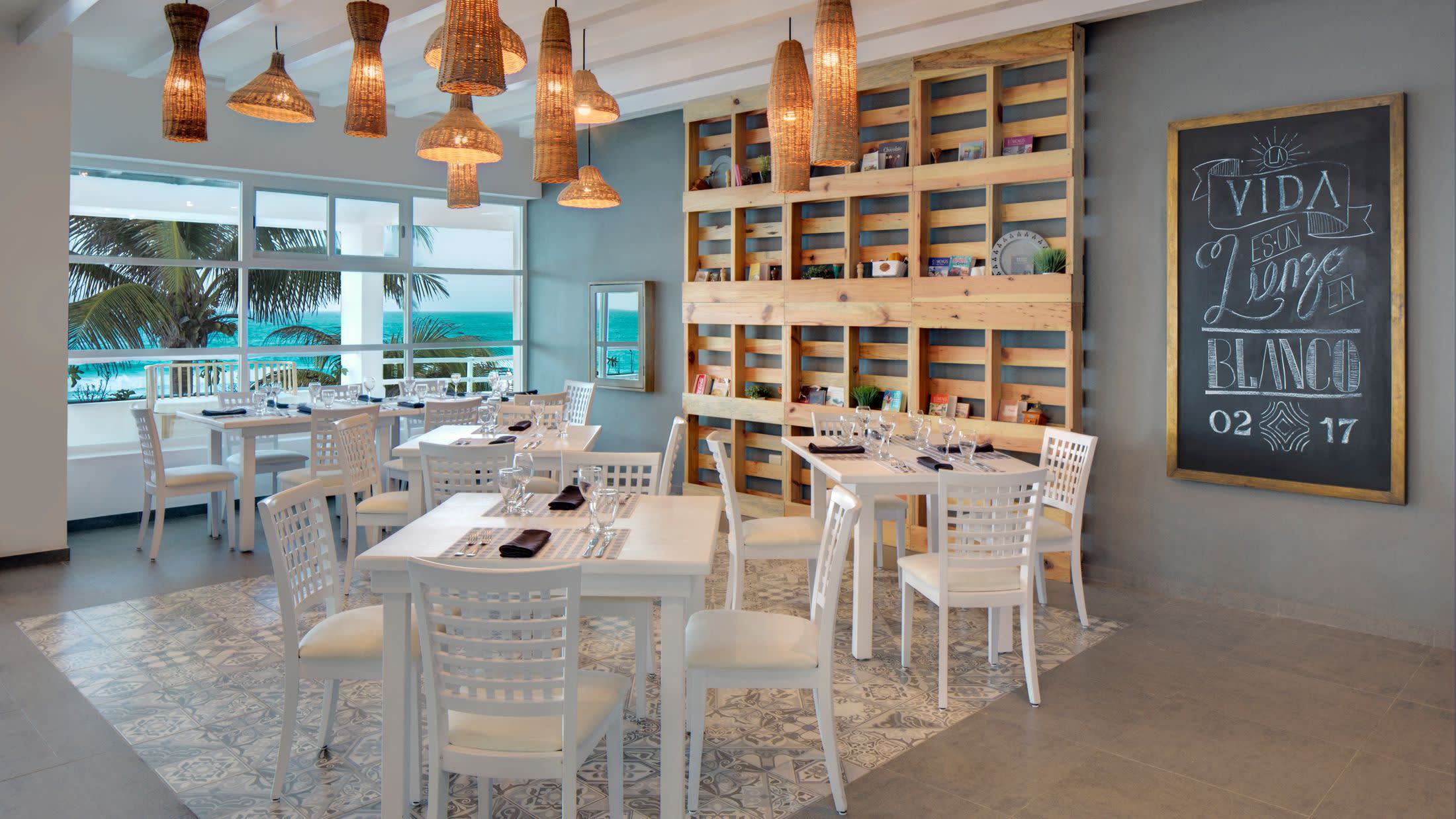 a dining room table in front of a building