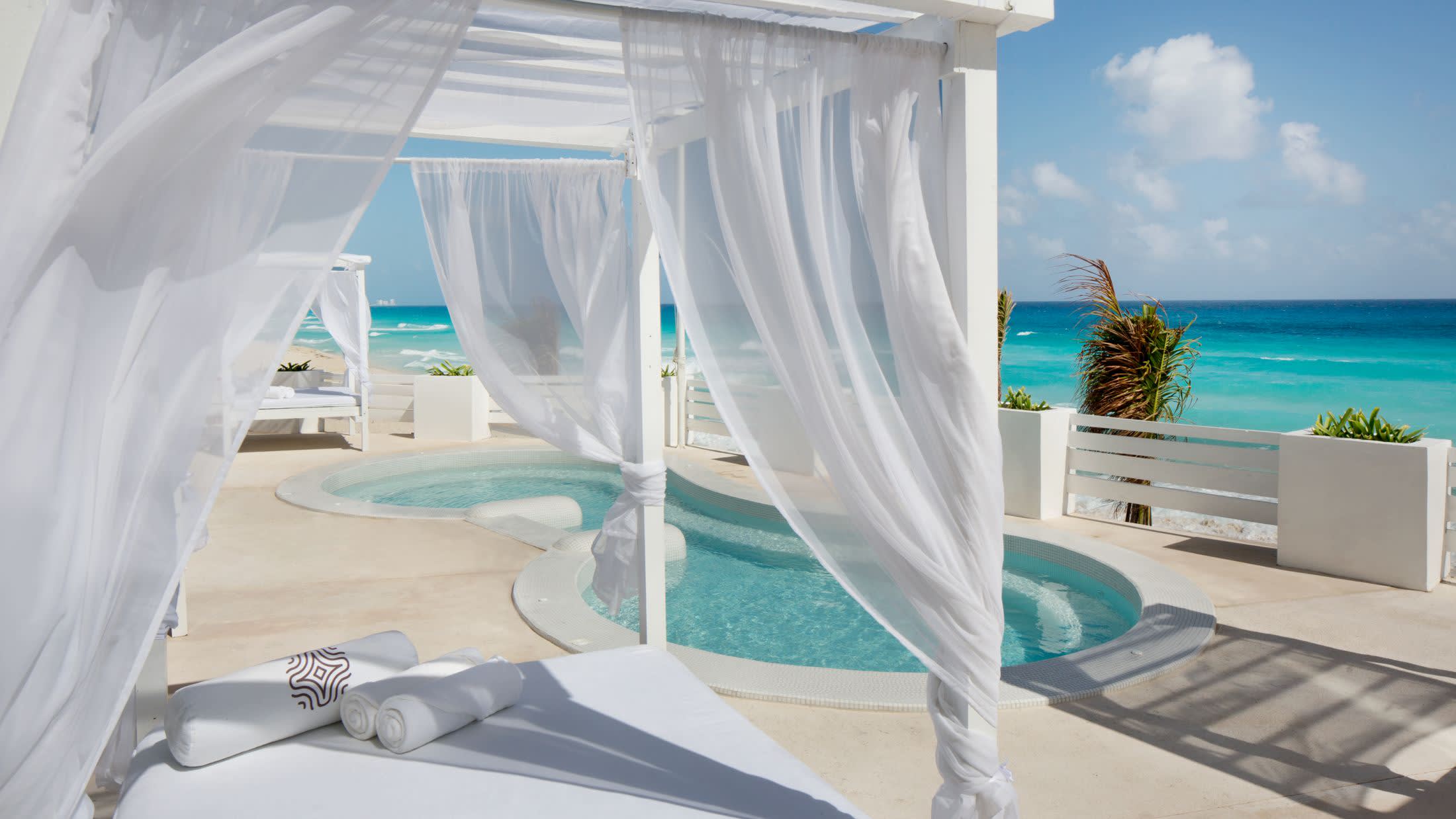 a chair sitting in front of a beach