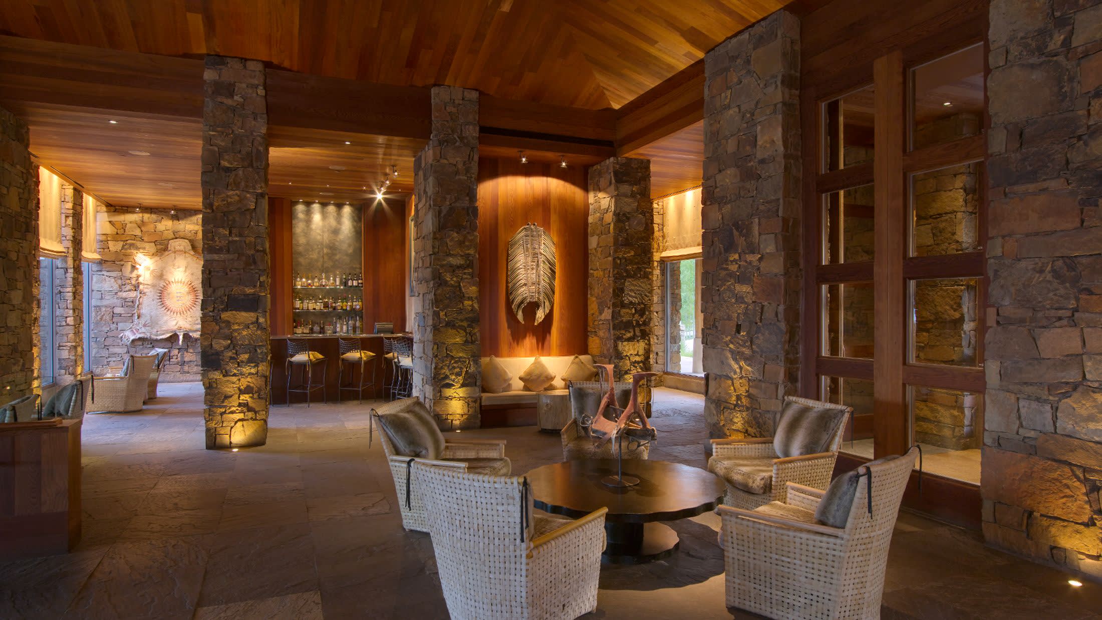 a living room filled with furniture and a fireplace