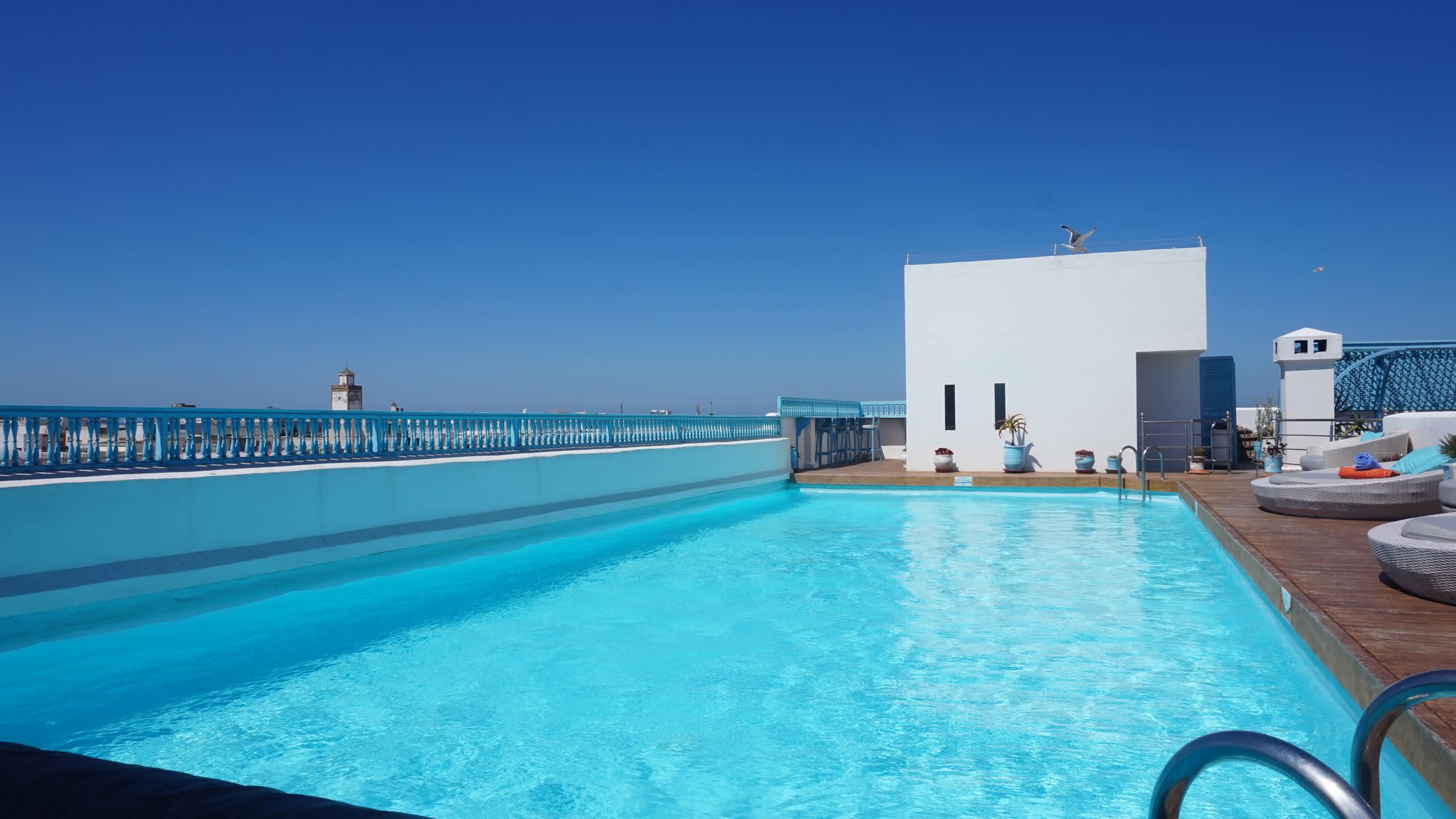 a person swimming in a pool of water
