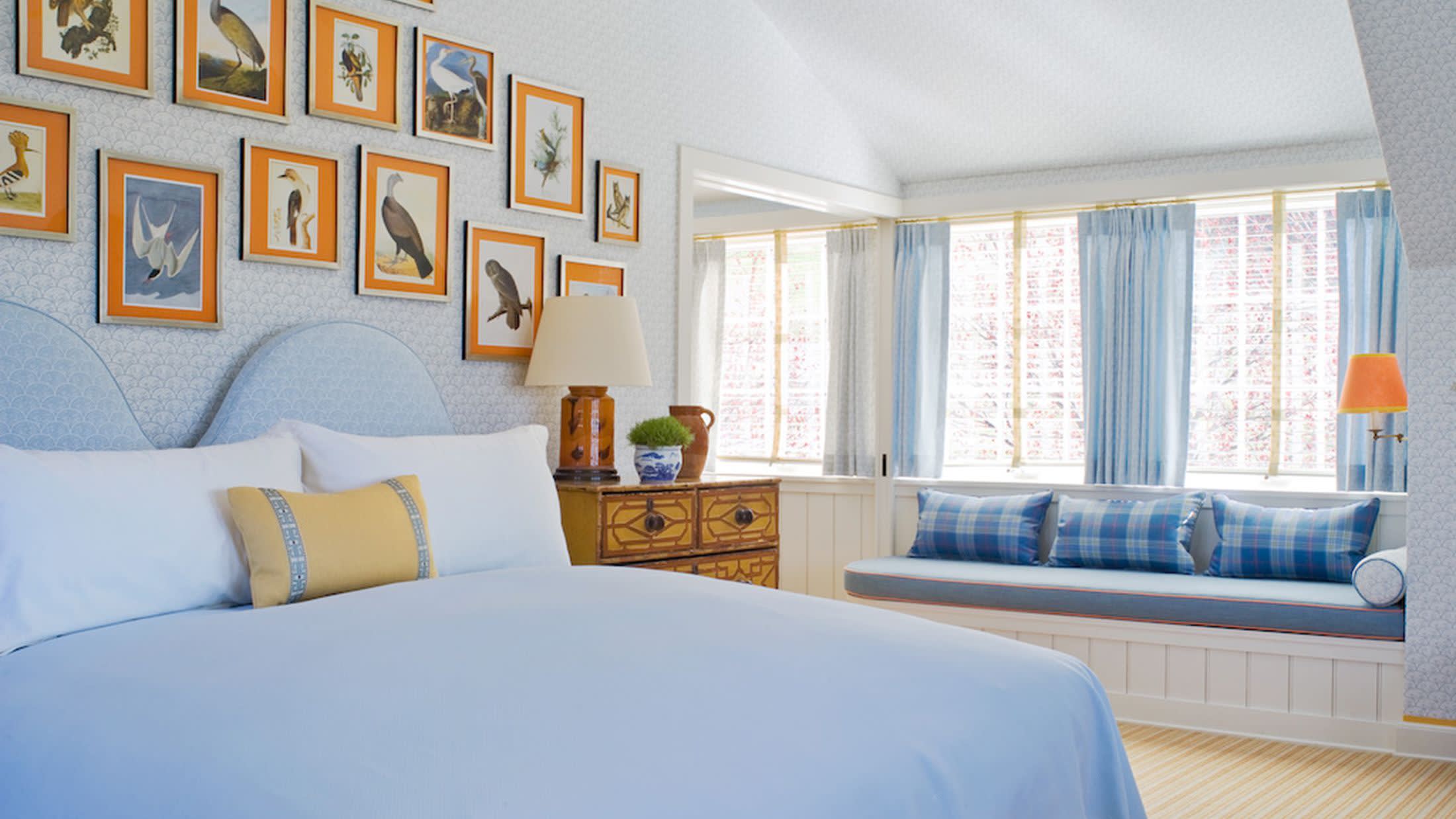 a bedroom with a bed in a room