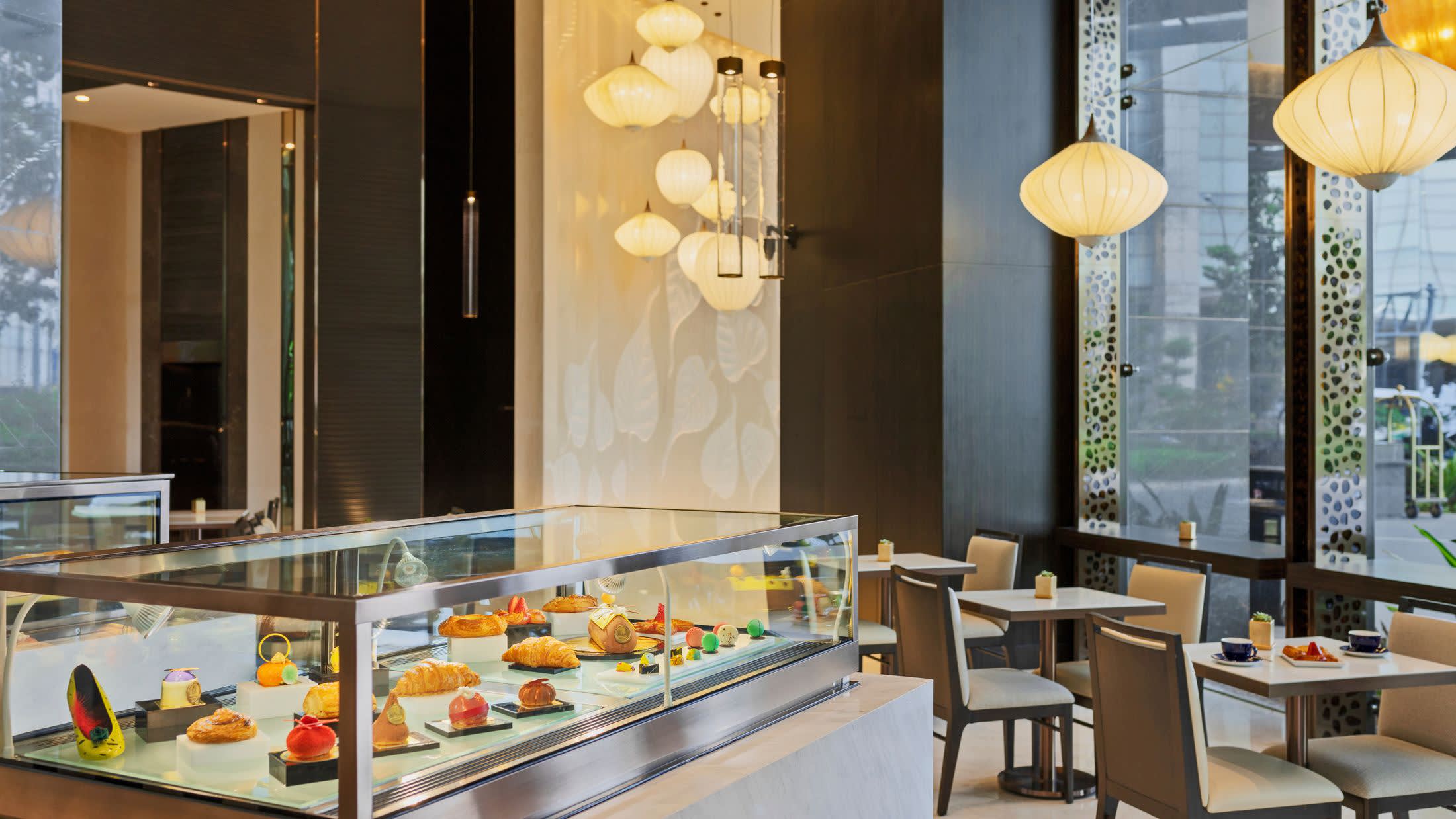 a dining room table in front of a window