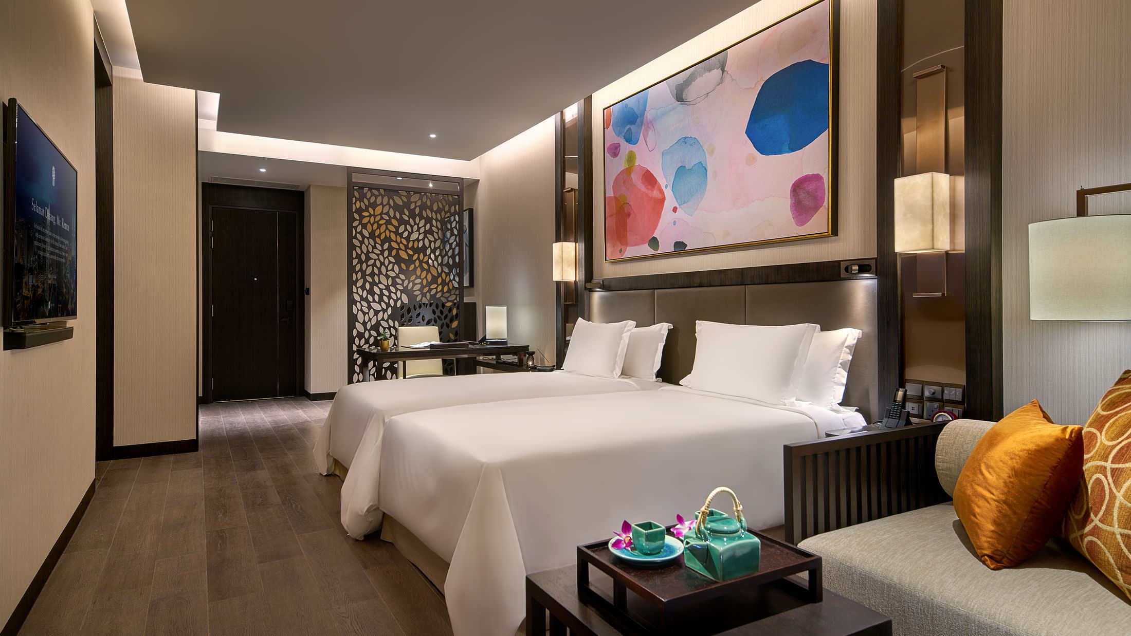 a bedroom with a large mirror