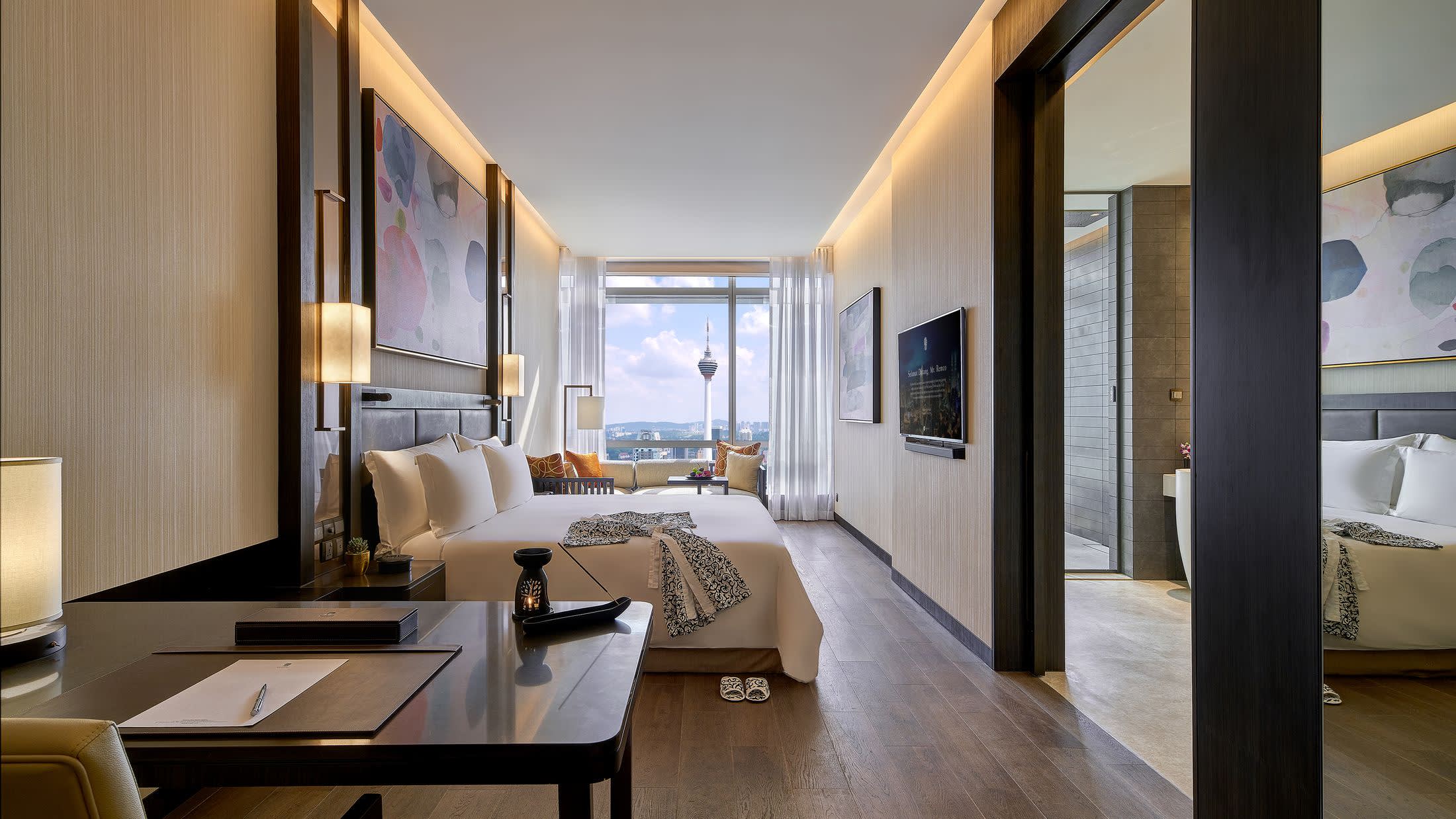 a living room filled with furniture and a large window