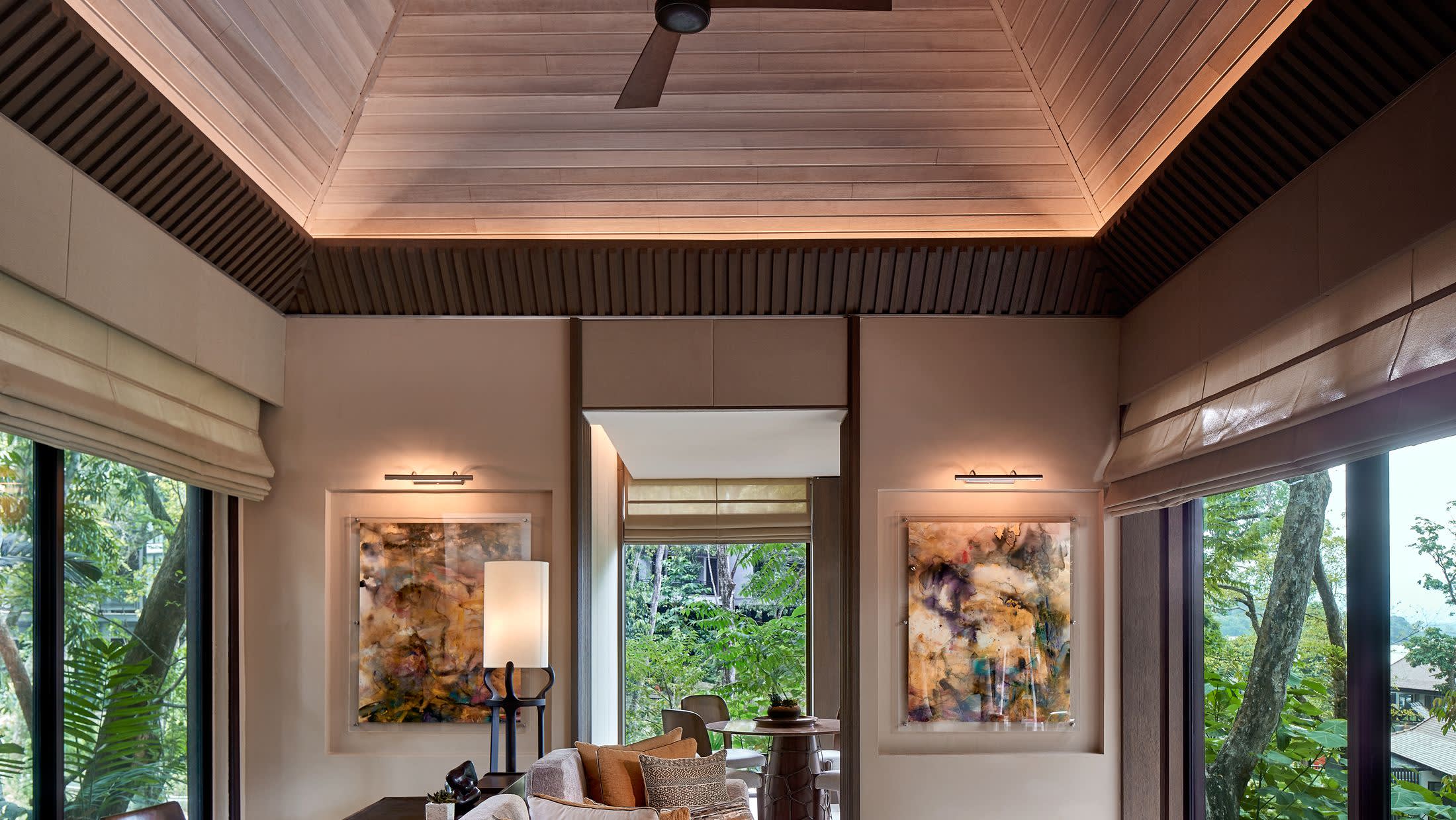 a room filled with furniture and a large window