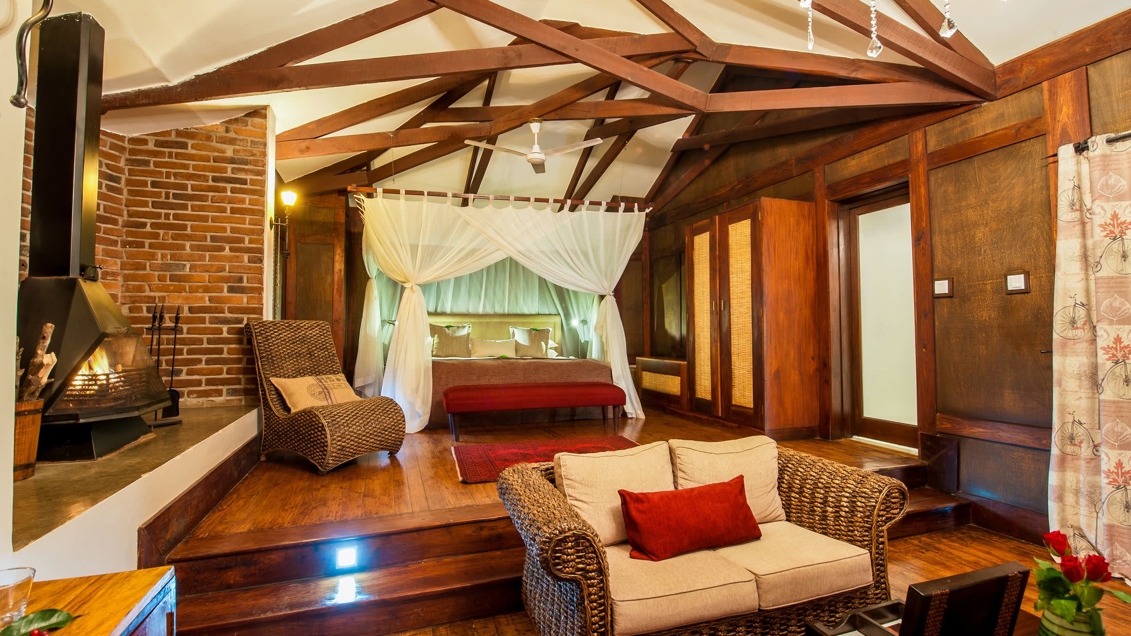 a room filled with furniture and a fireplace