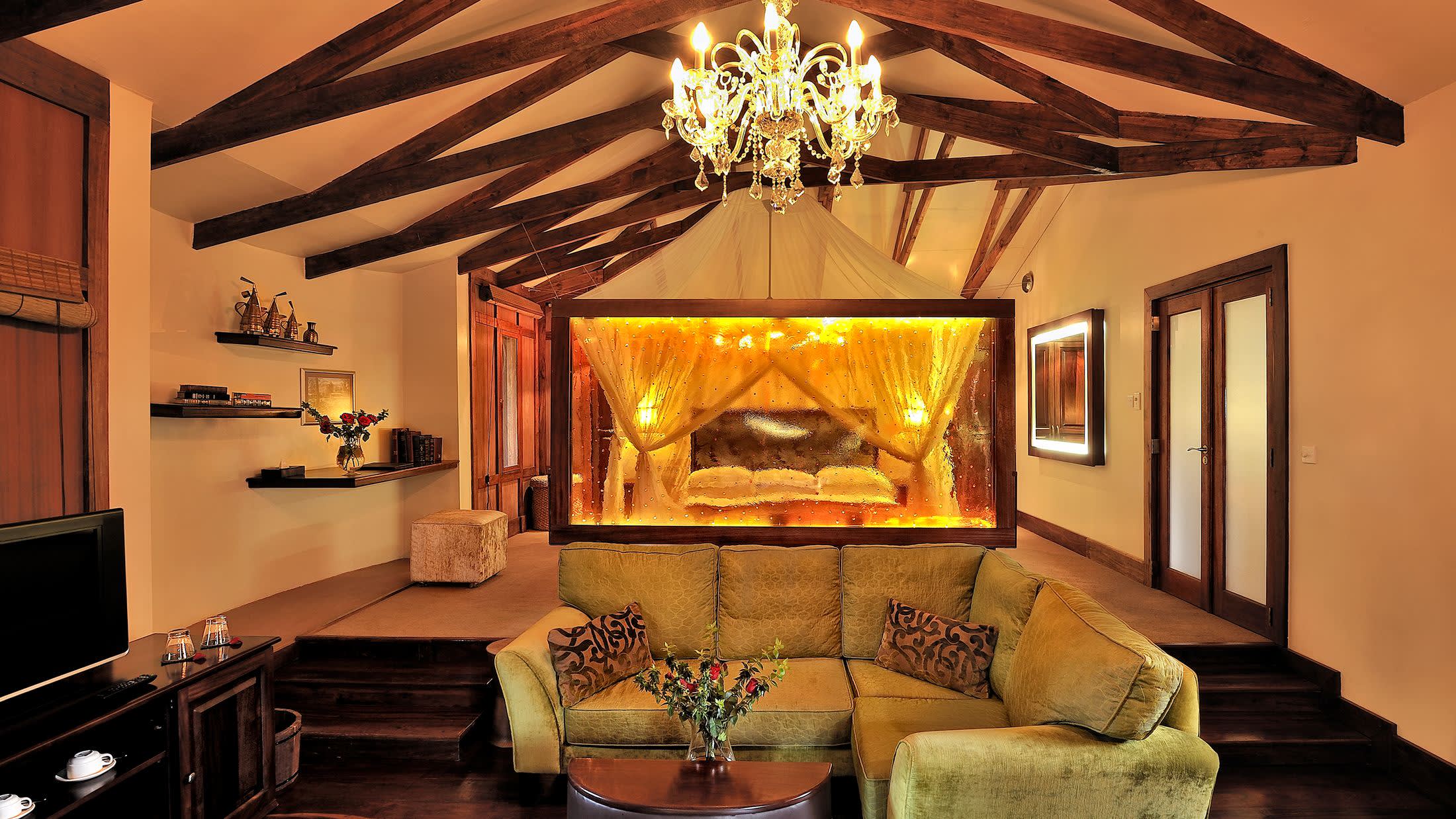 a living room filled with furniture and a fire place