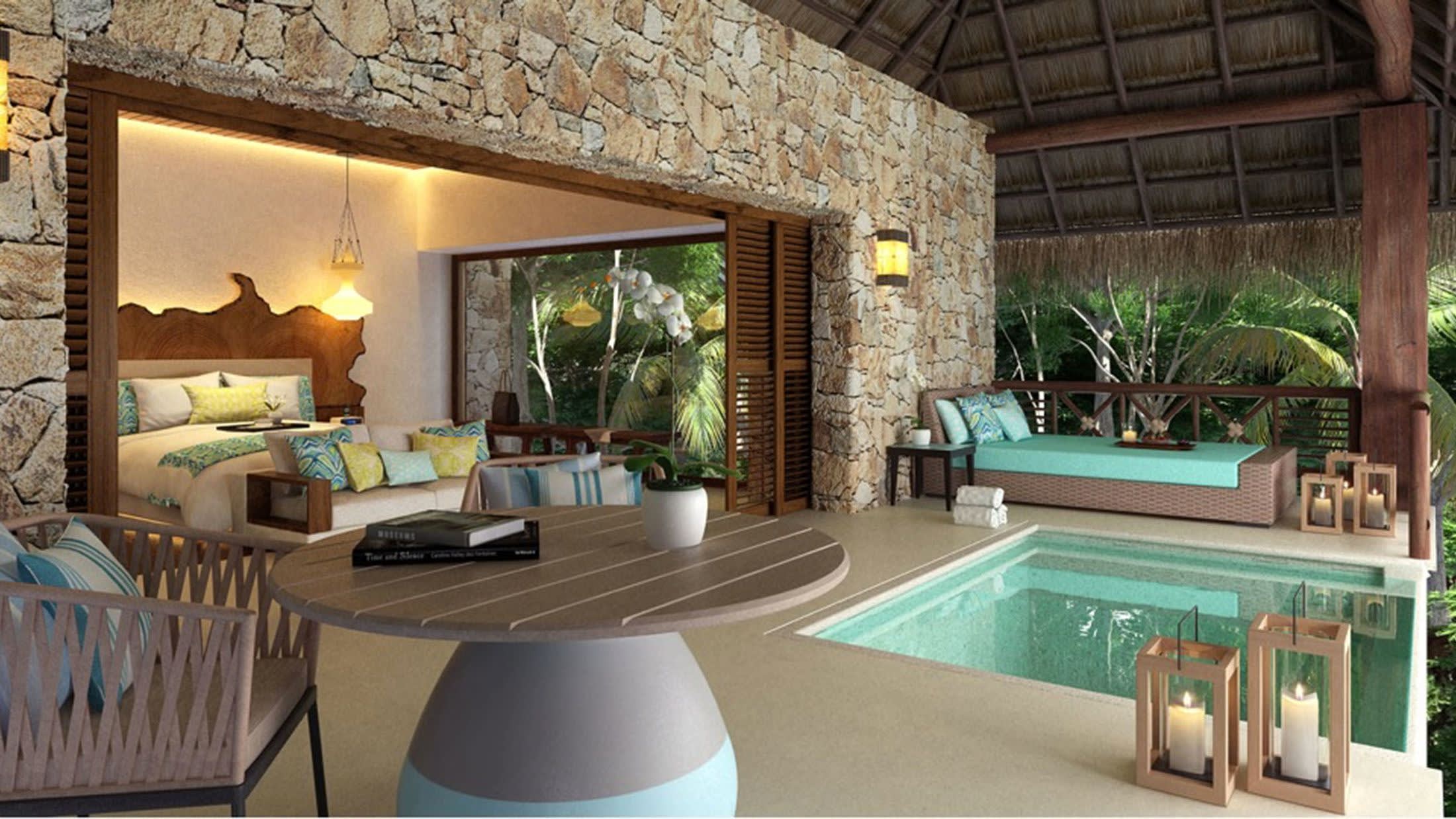 a living room filled with furniture and a fire place