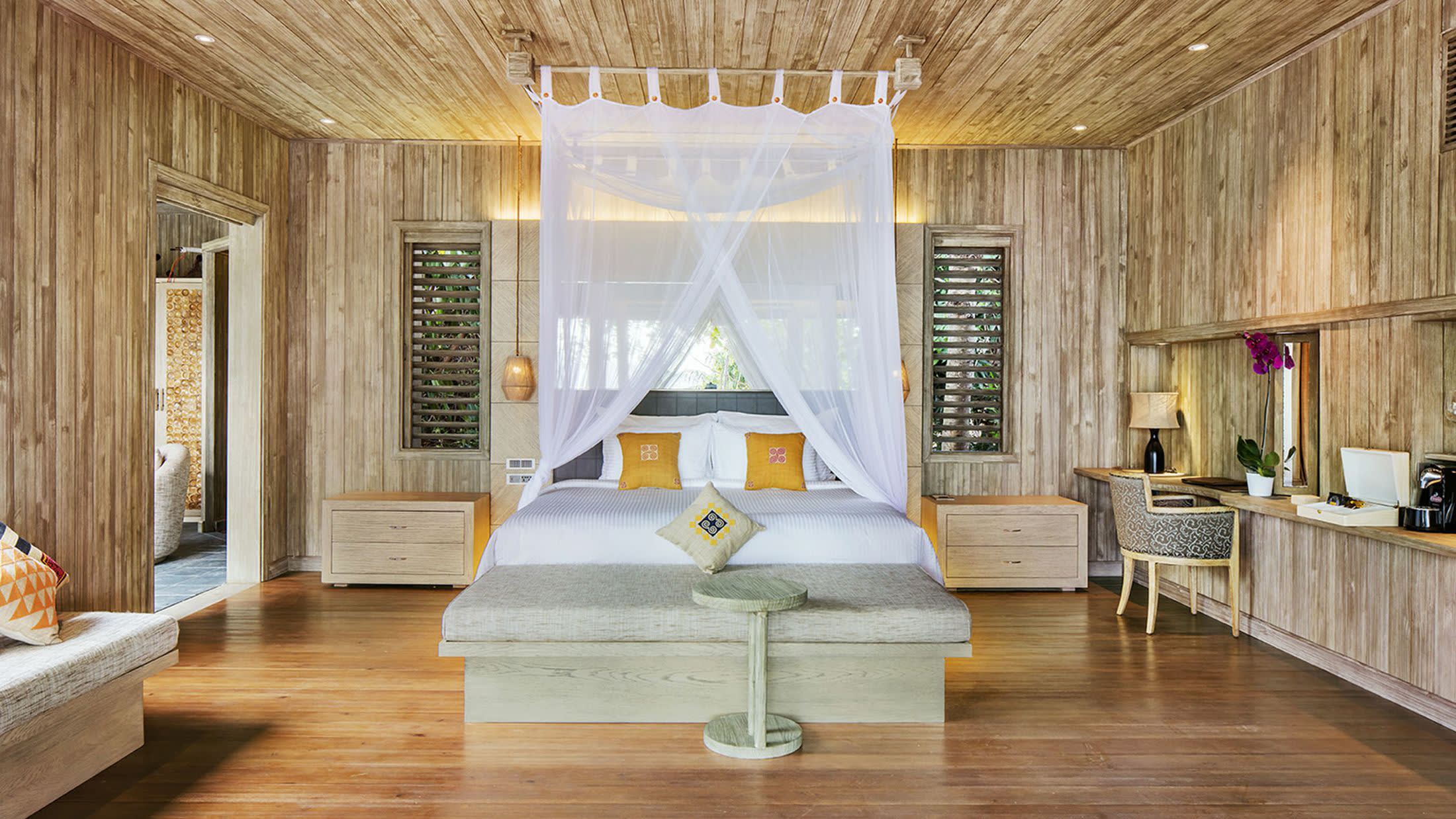 a living room with a wooden table