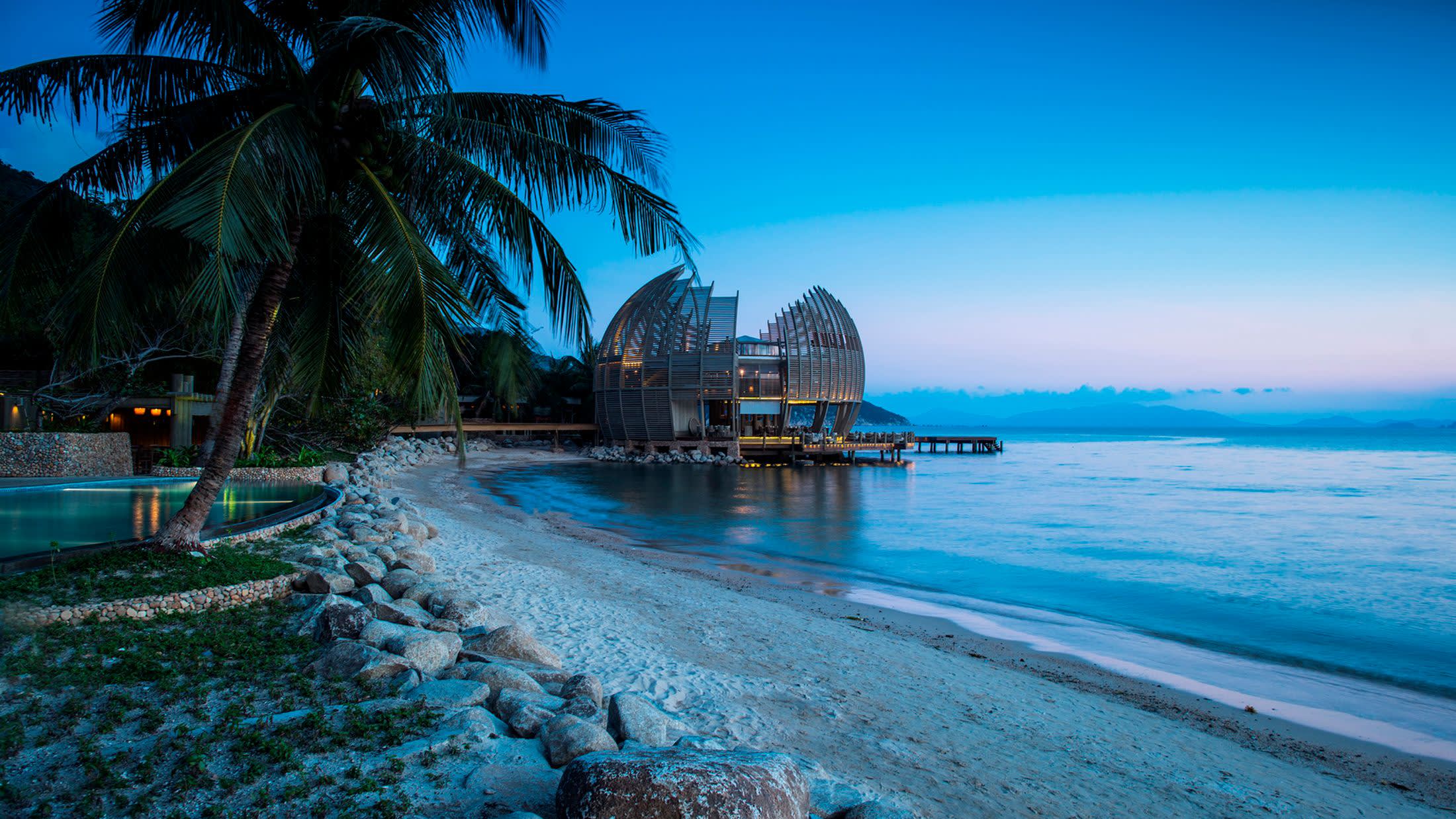 a pool next to a body of water