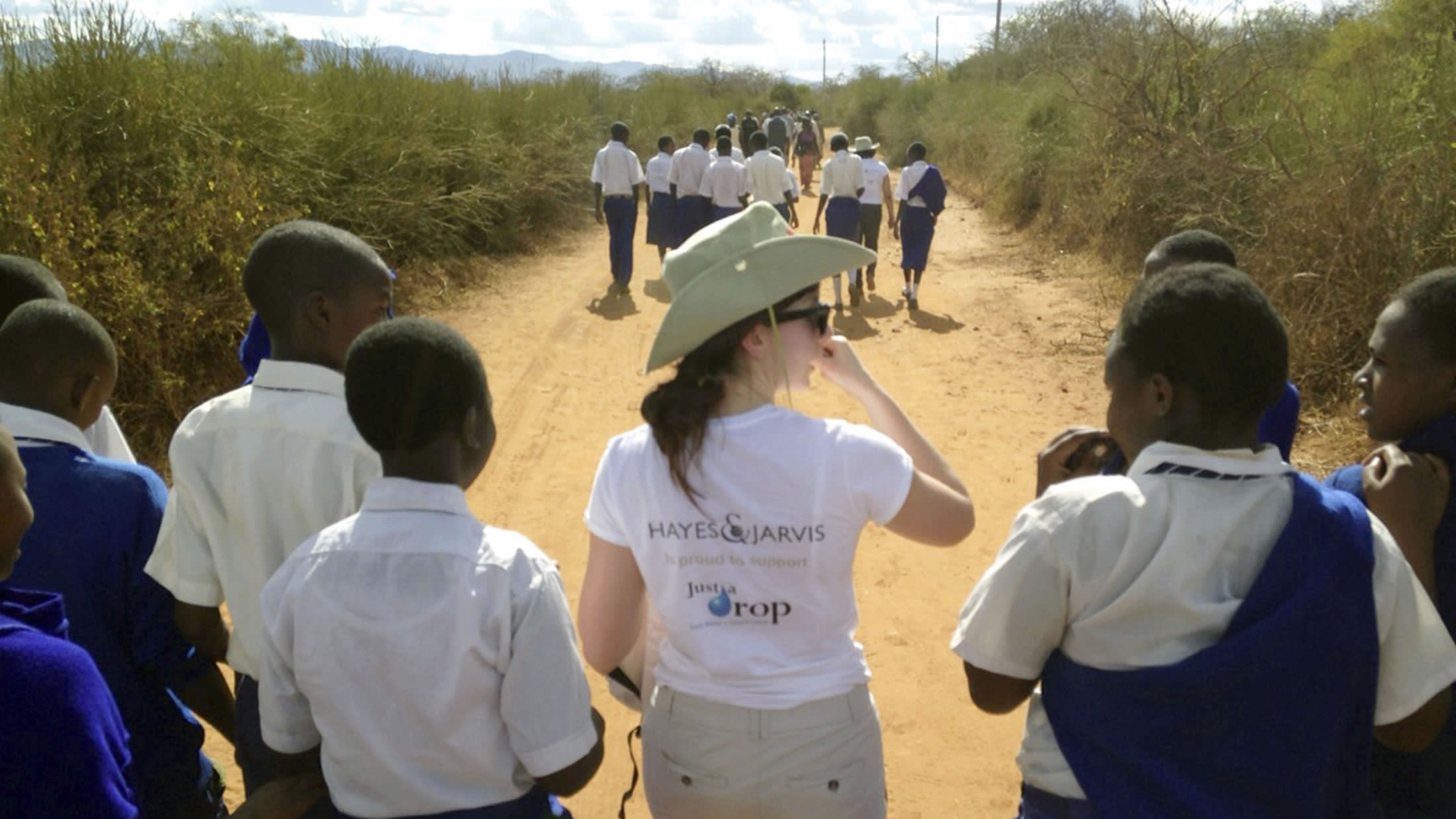 a group of people around each other