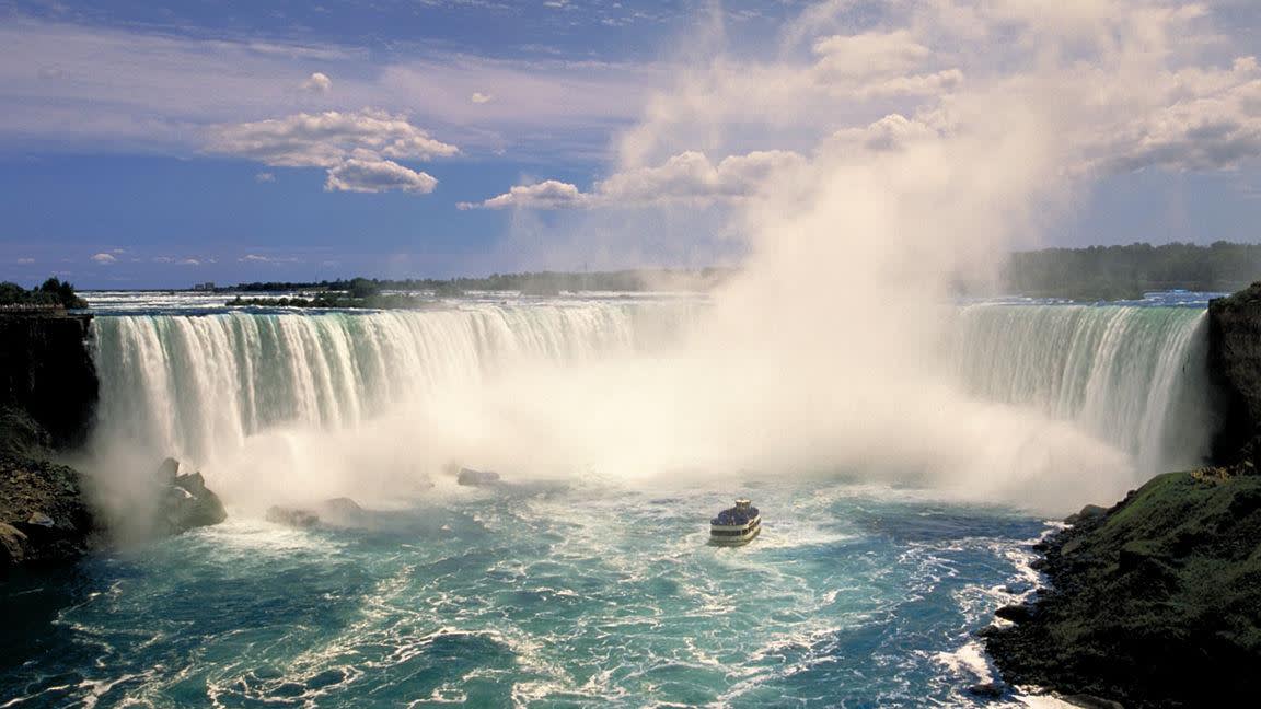 a body of water with smoke coming out of it