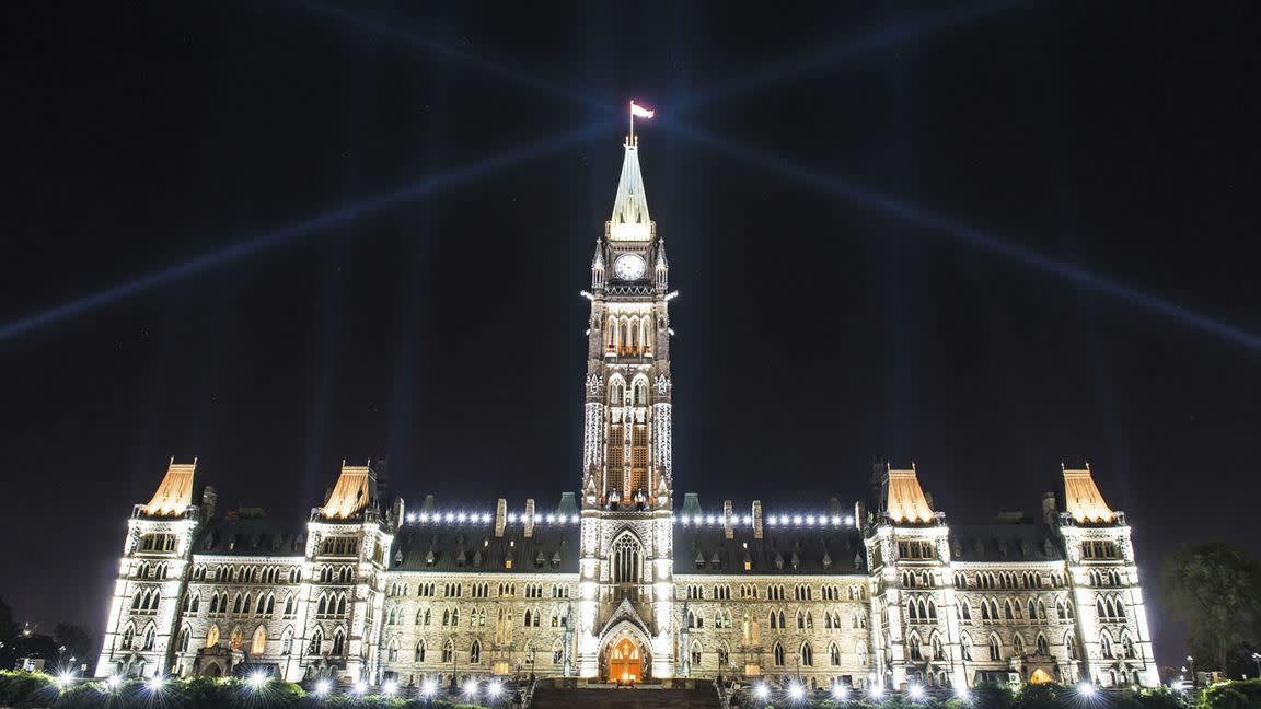 a clock tower lit up at night
