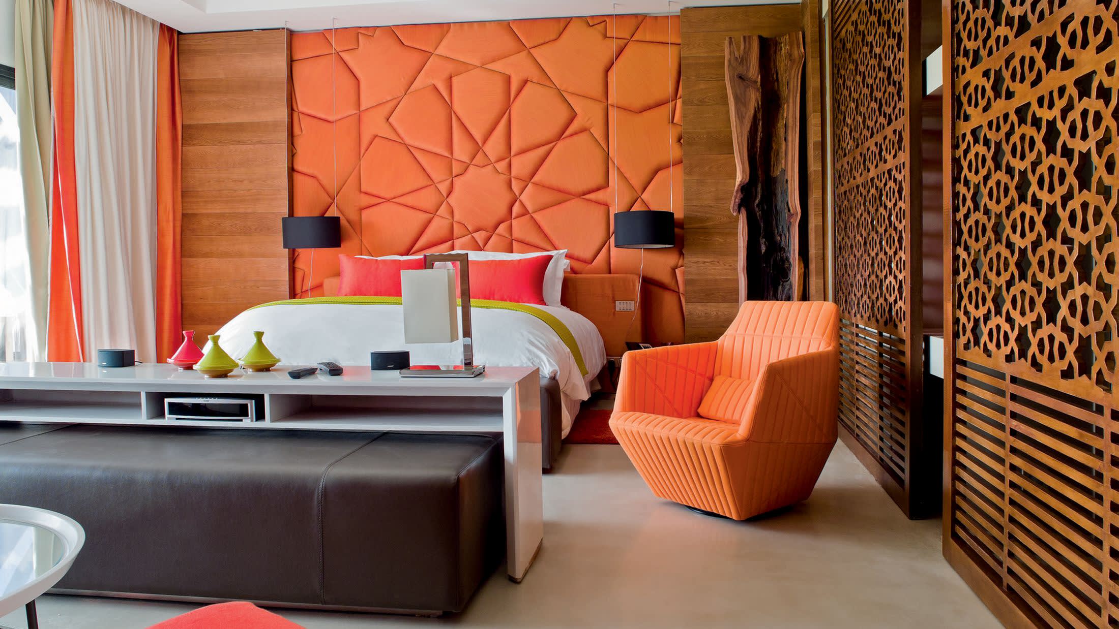 a large red chair in a room