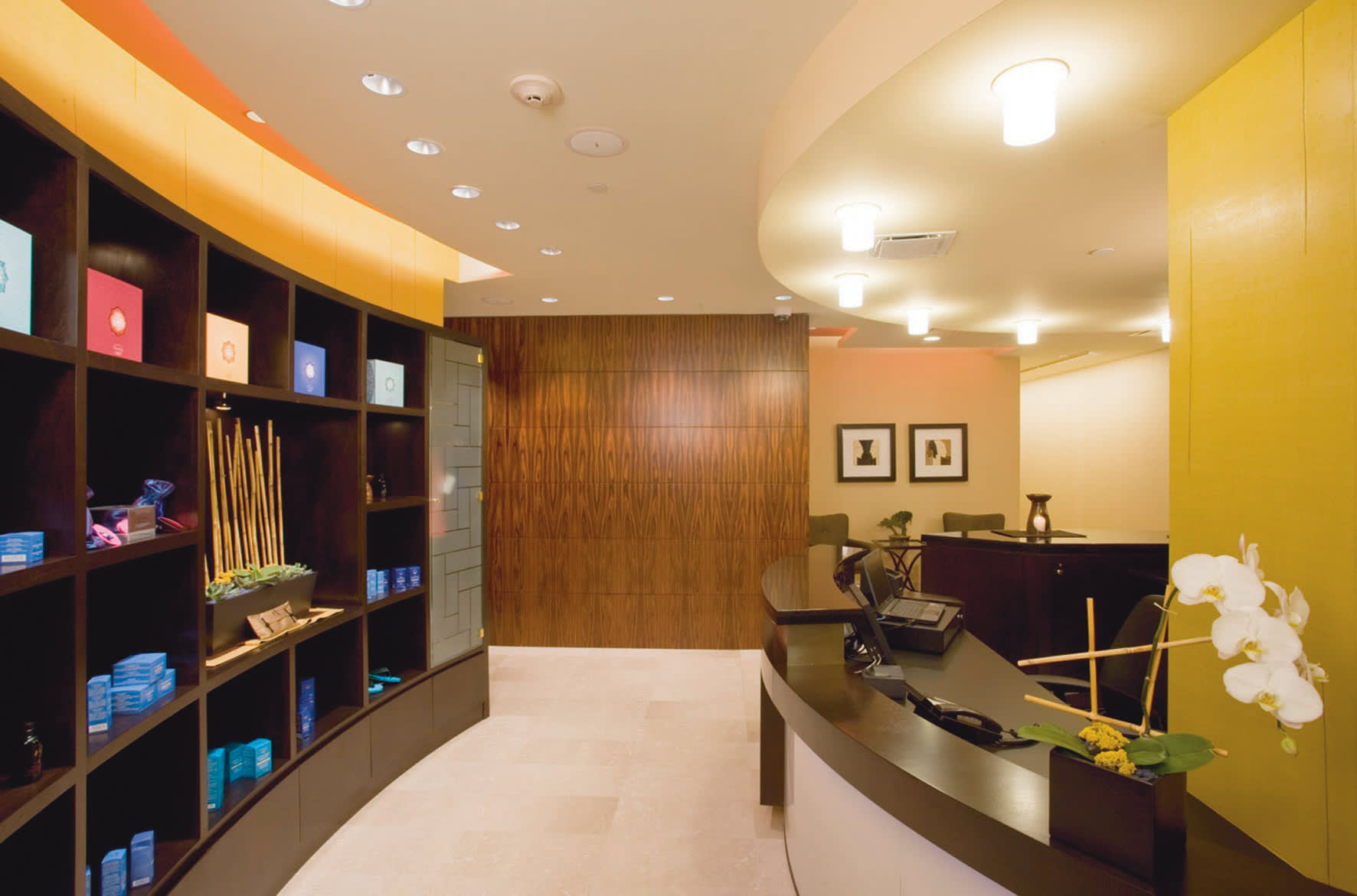 a room filled with furniture and a large mirror