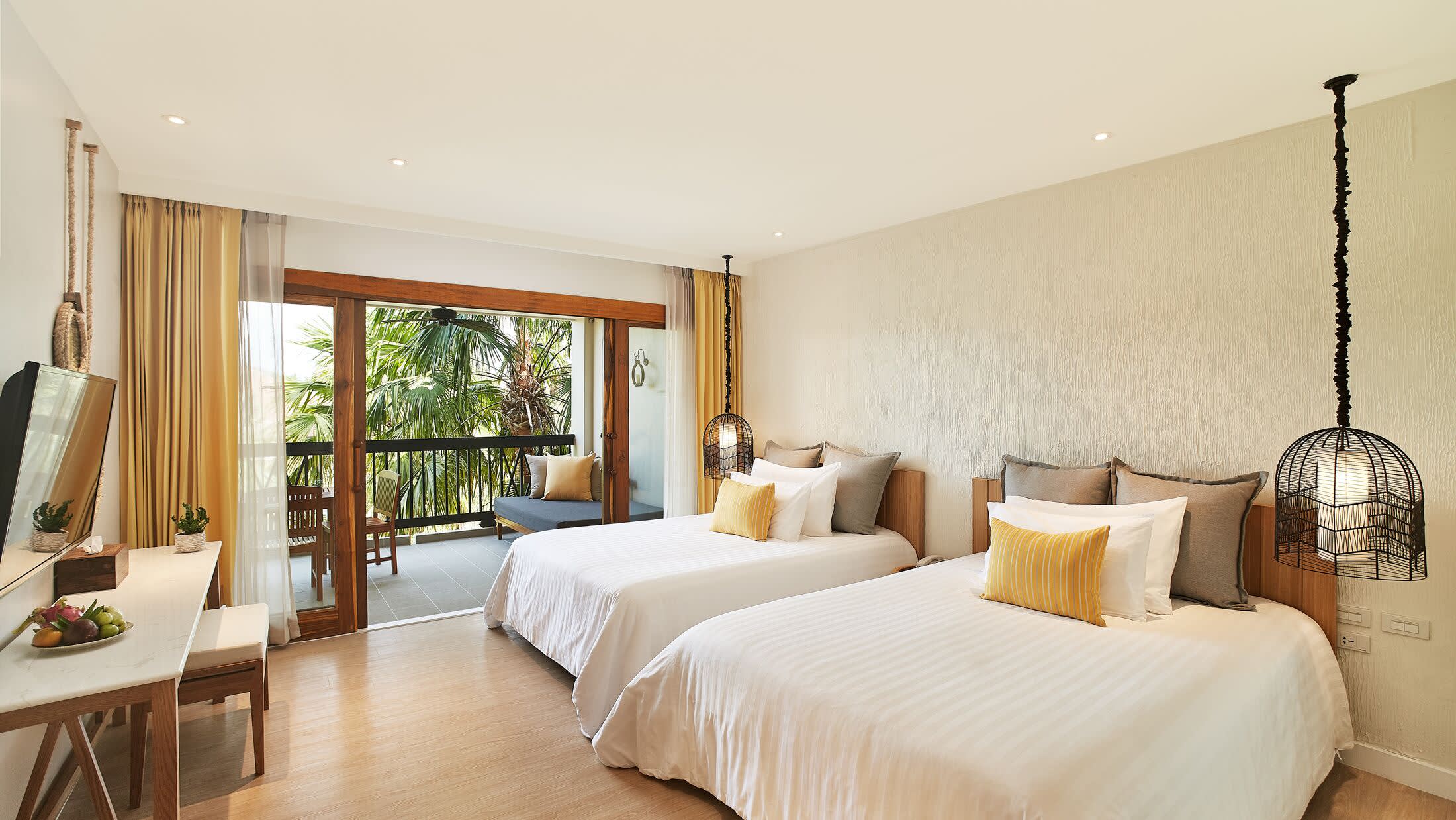 a bedroom with a large bed in a hotel room