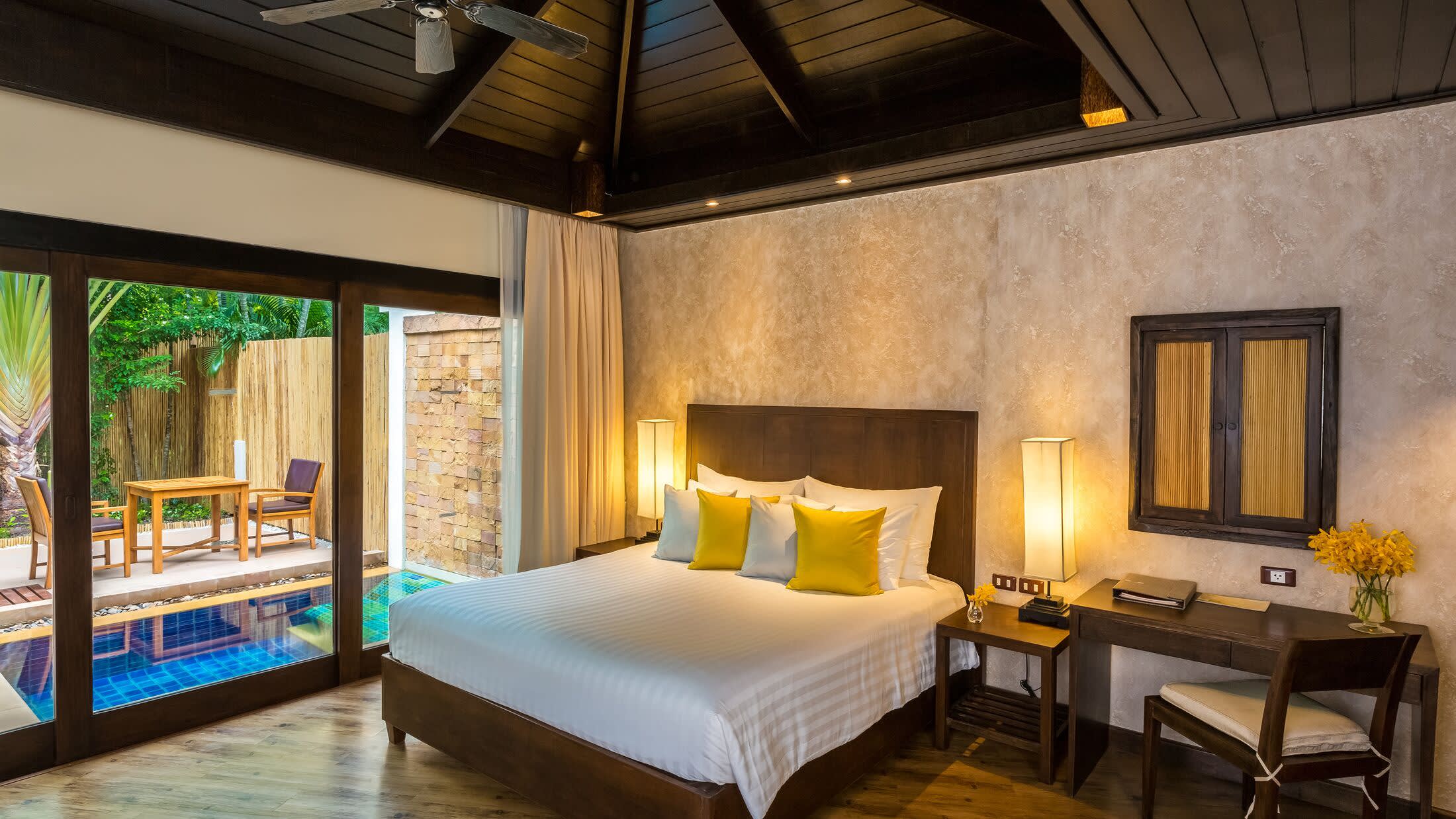 a bedroom with a large bed in a room