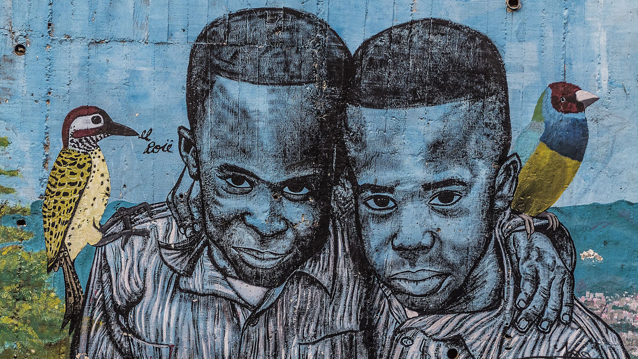 a graffiti covered wall