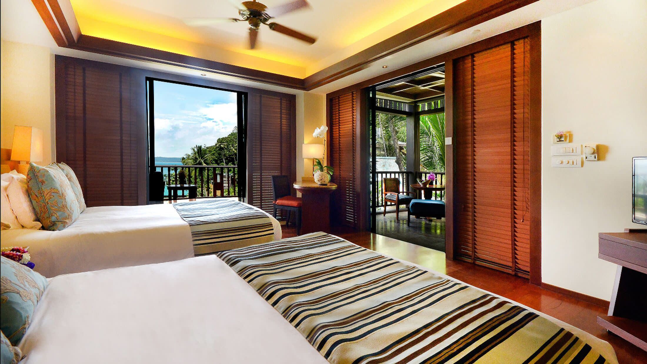 a bedroom with a bed and window in a room