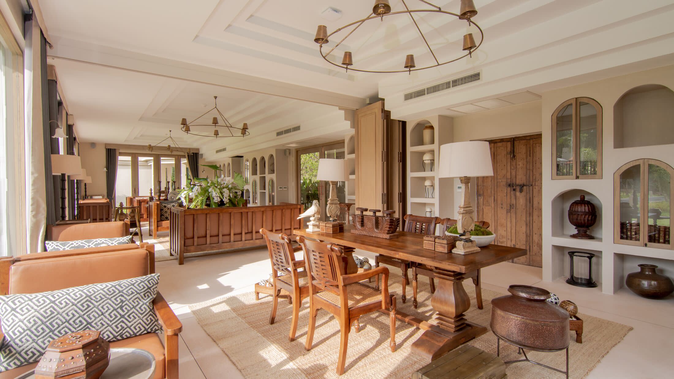 a living room filled with furniture and a fireplace