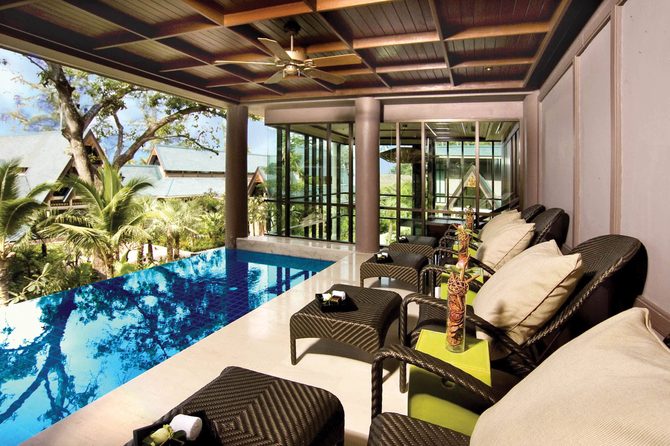 a room filled with furniture and a large window