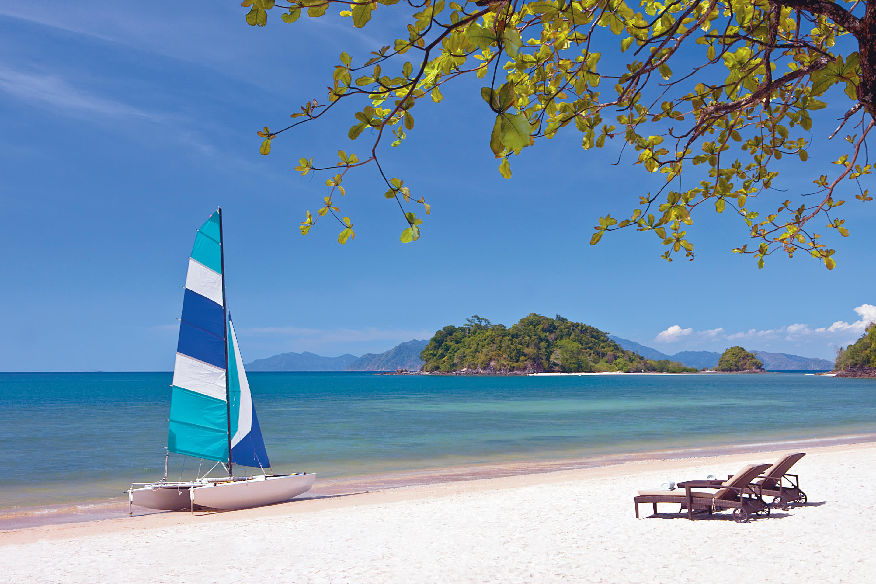 a boat sitting on top of a beach