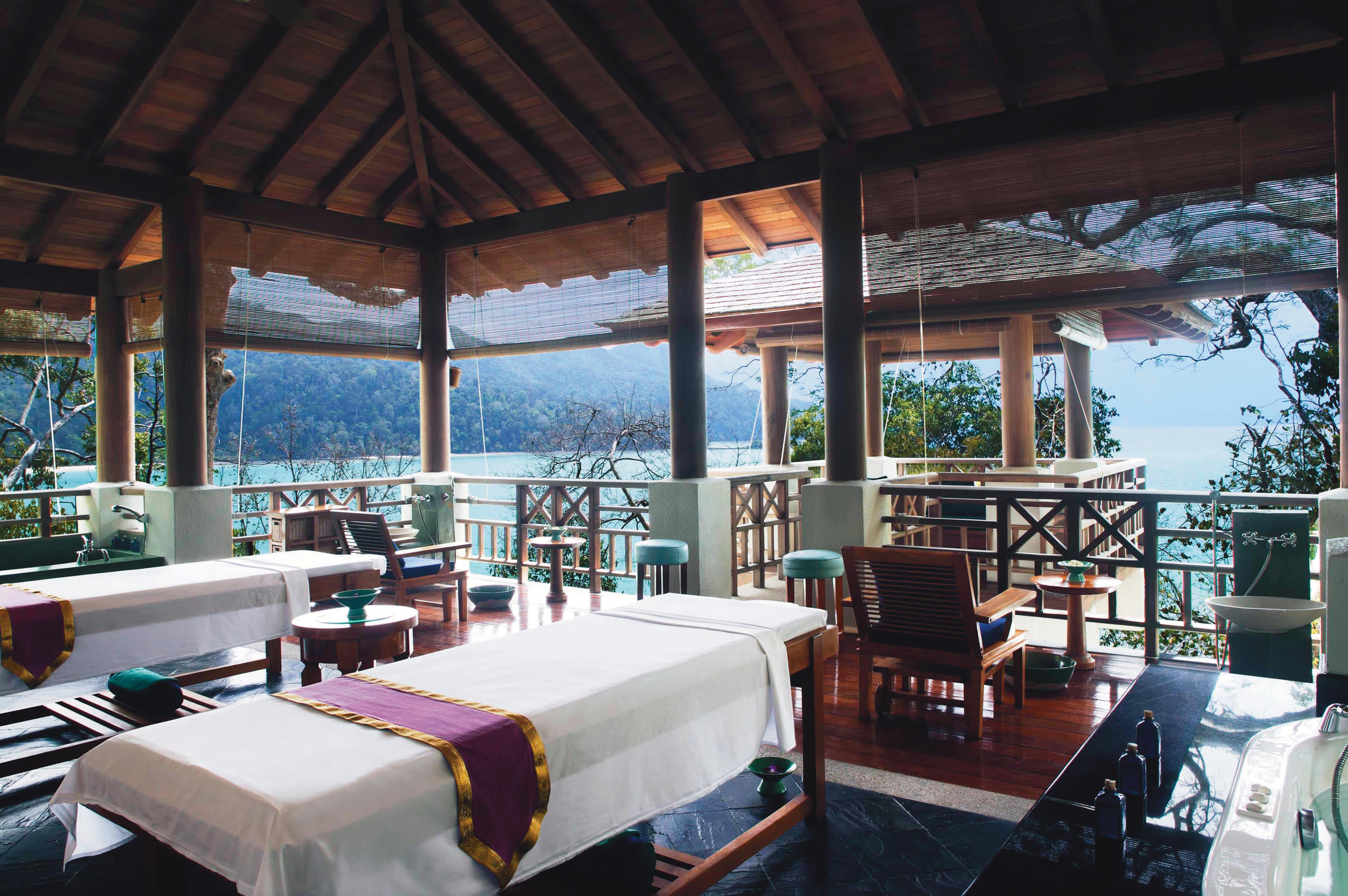 a room filled with furniture and a large window