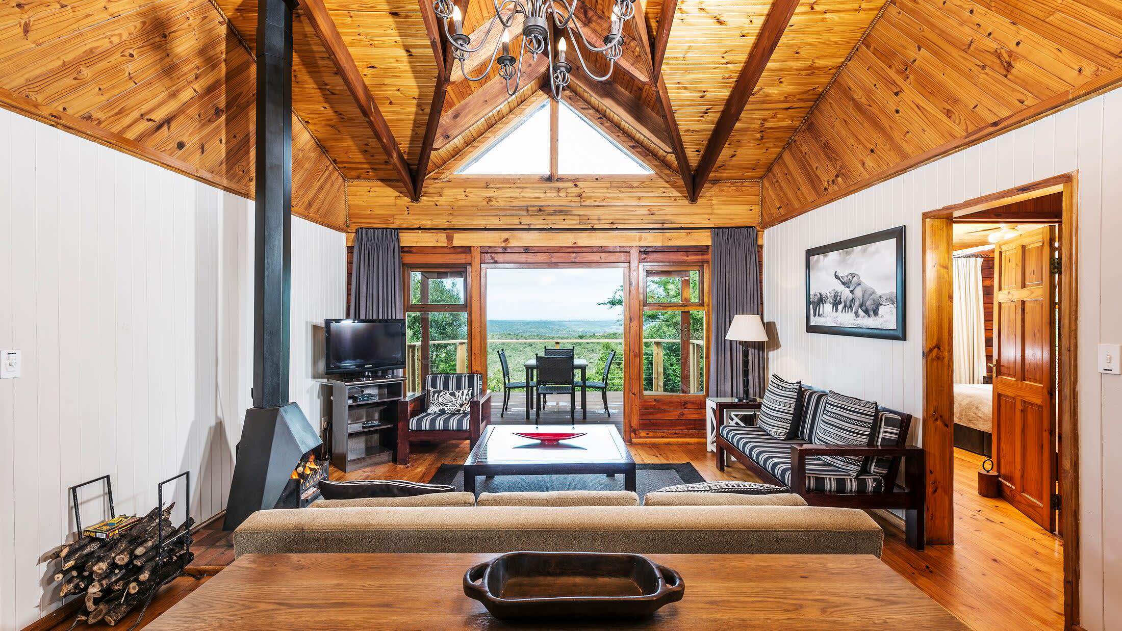 a room filled with furniture and a fireplace