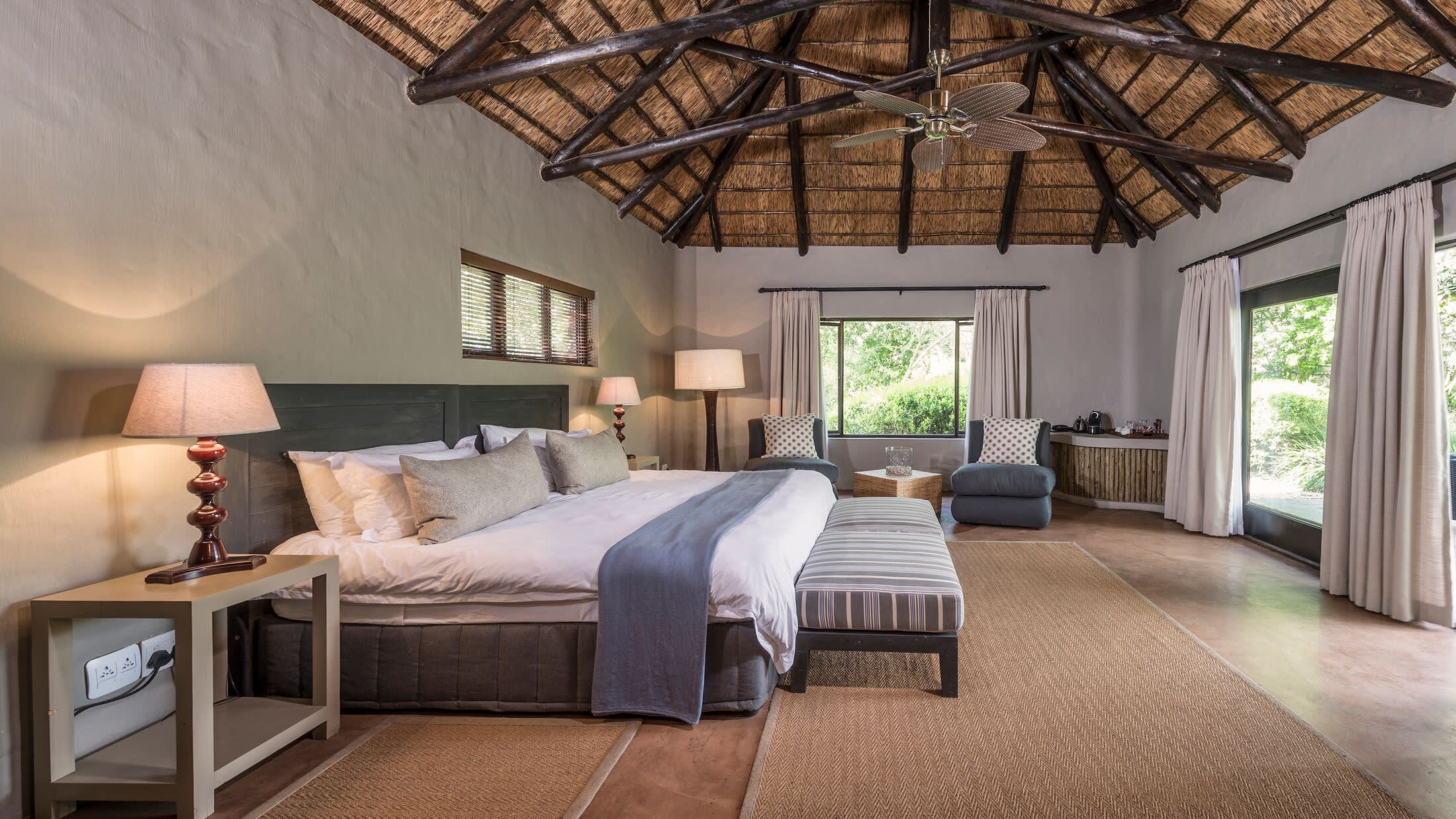 a bedroom with a large bed in a room