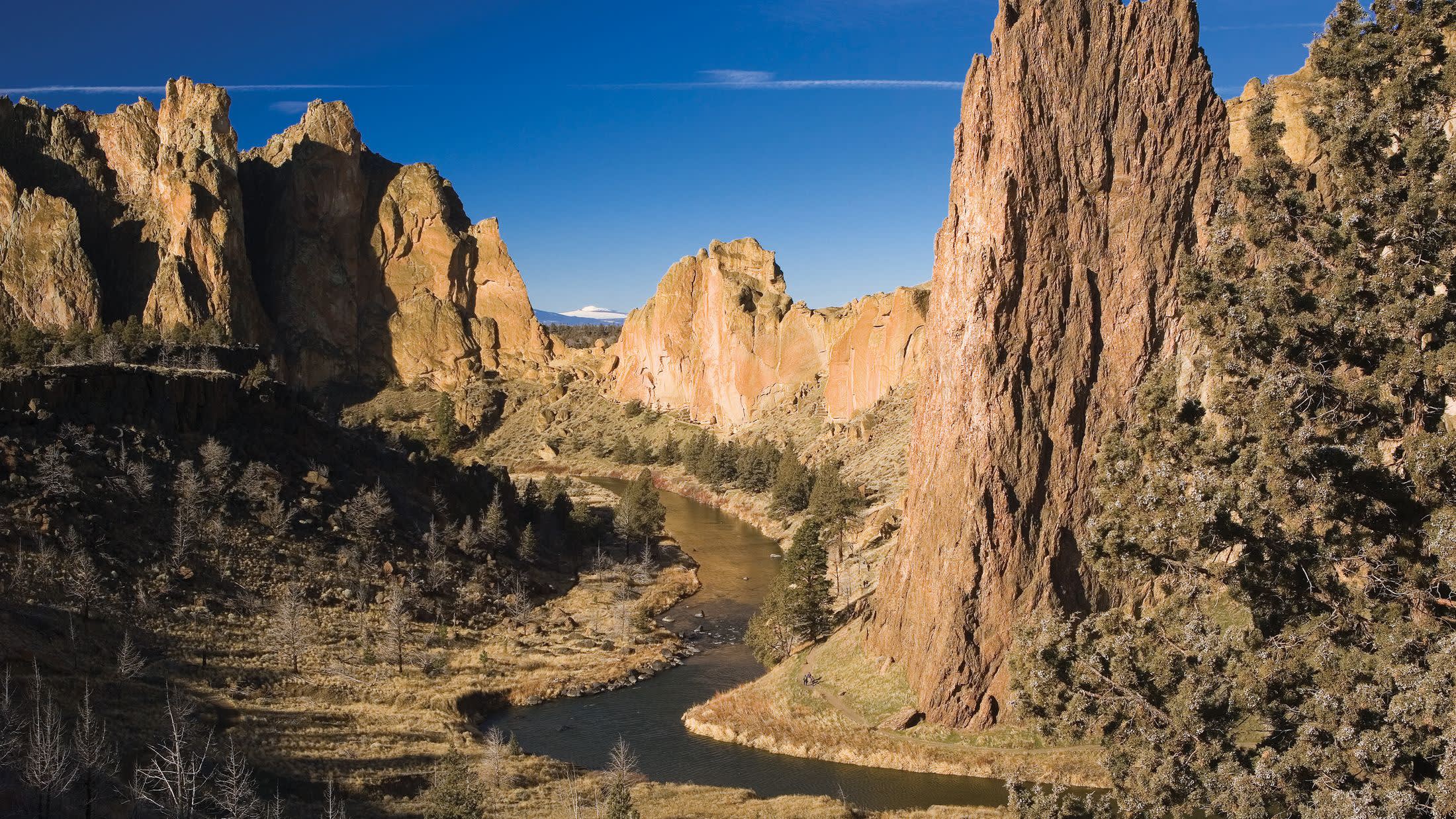 a canyon with Smith Rock State Park in the background