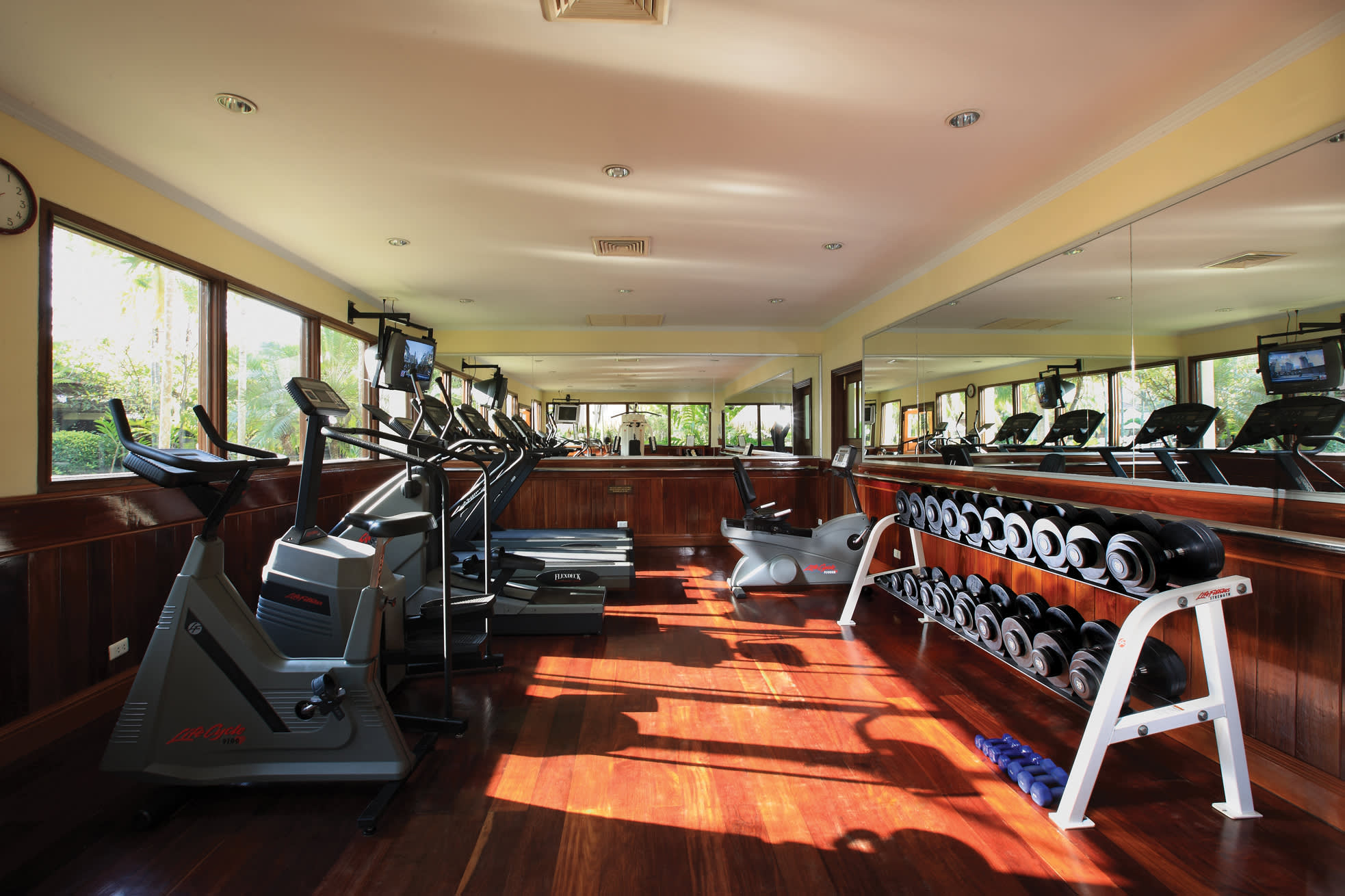 a room filled with furniture and a large window