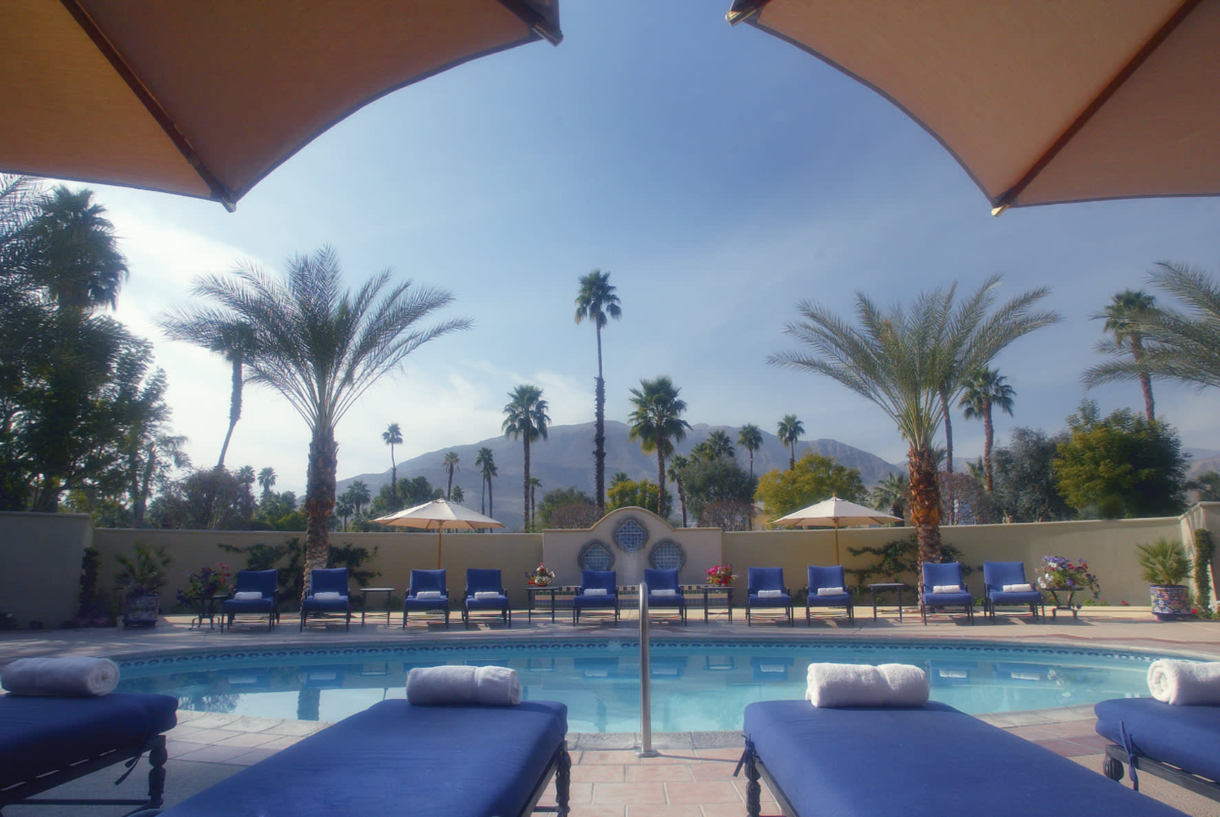 an umbrella sitting on top of a chair