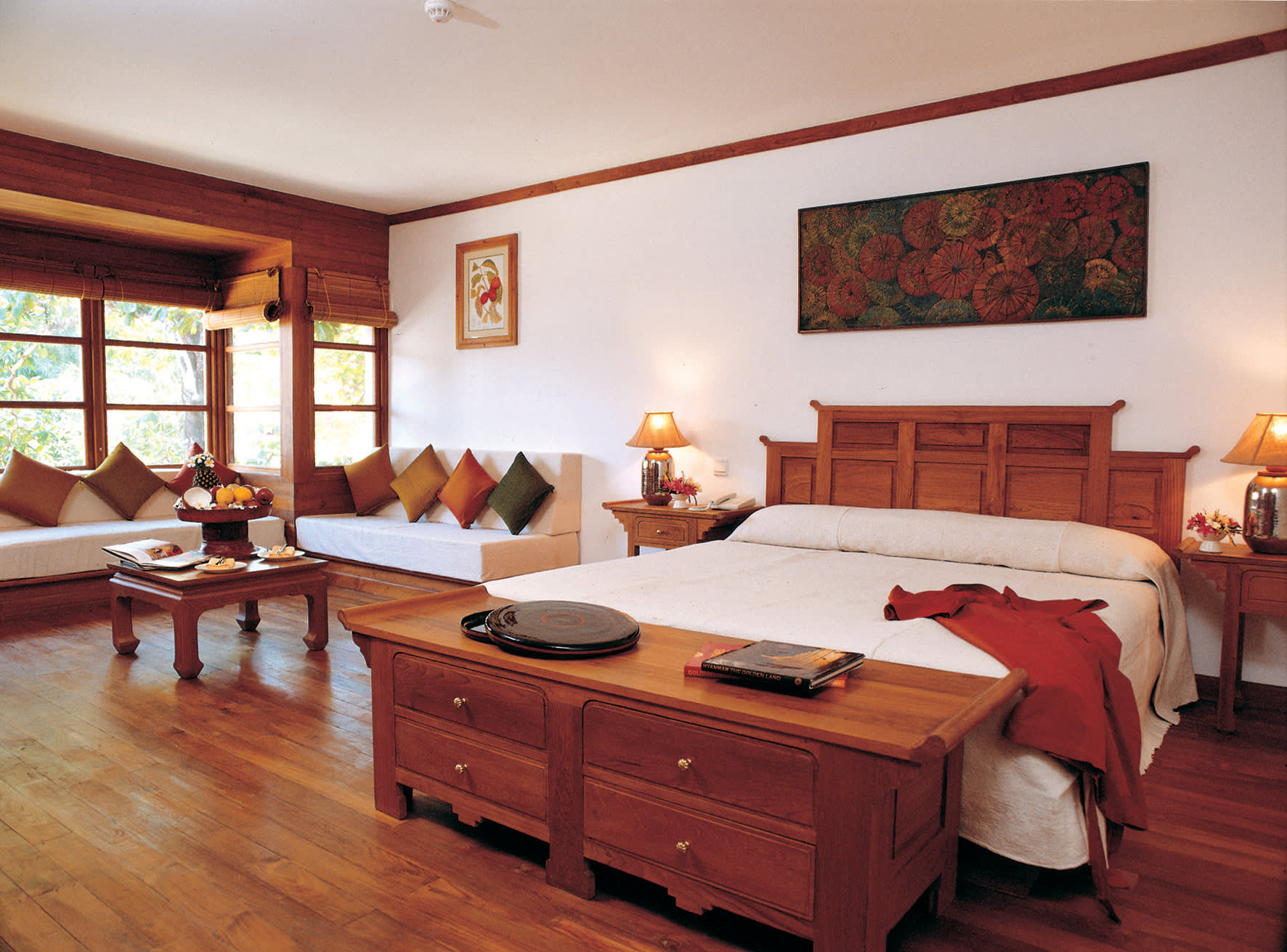 a living room filled with furniture and a wood floor