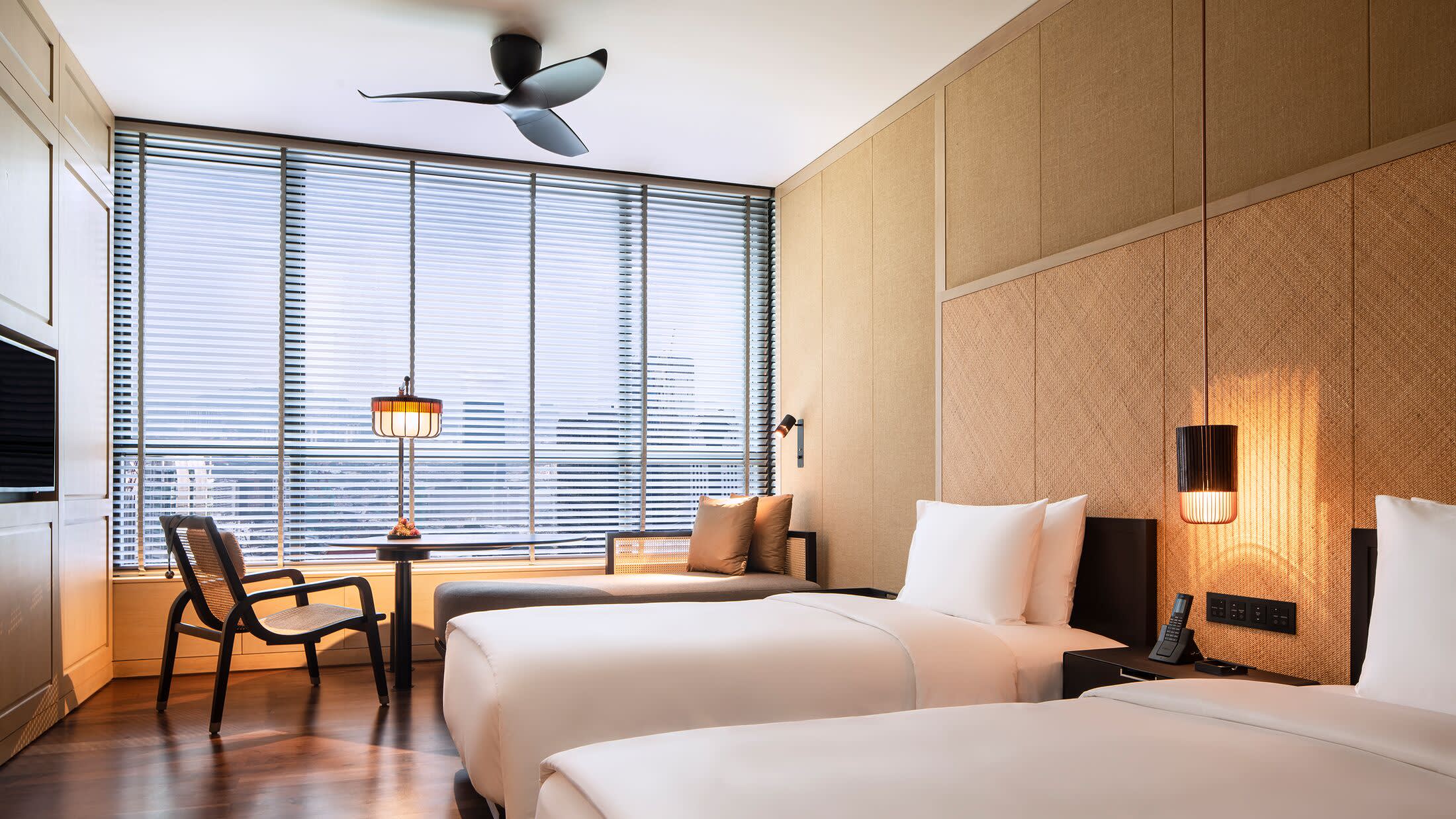 a bedroom with a bed in a hotel room