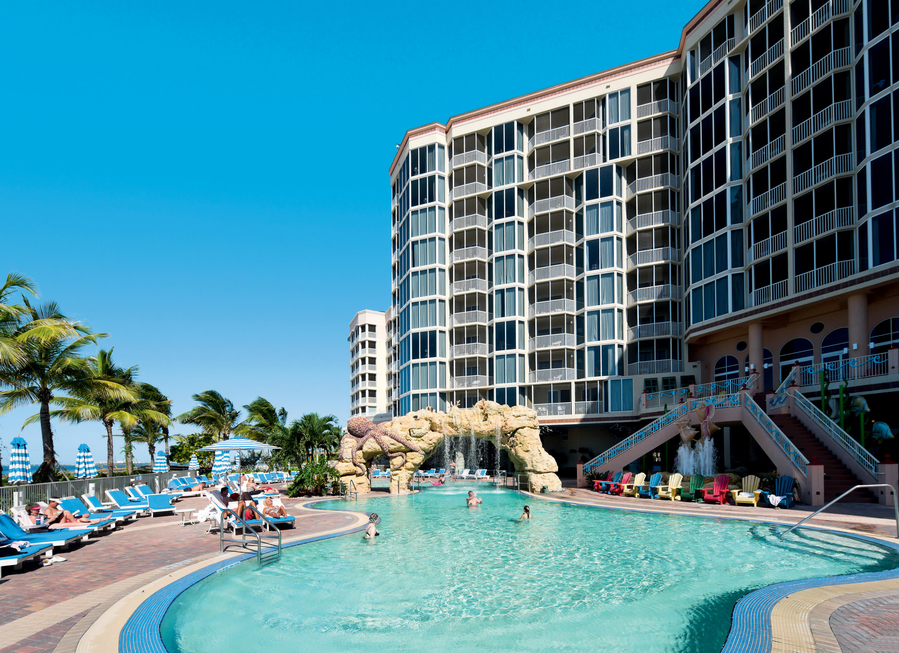 a group of people in a pool of water