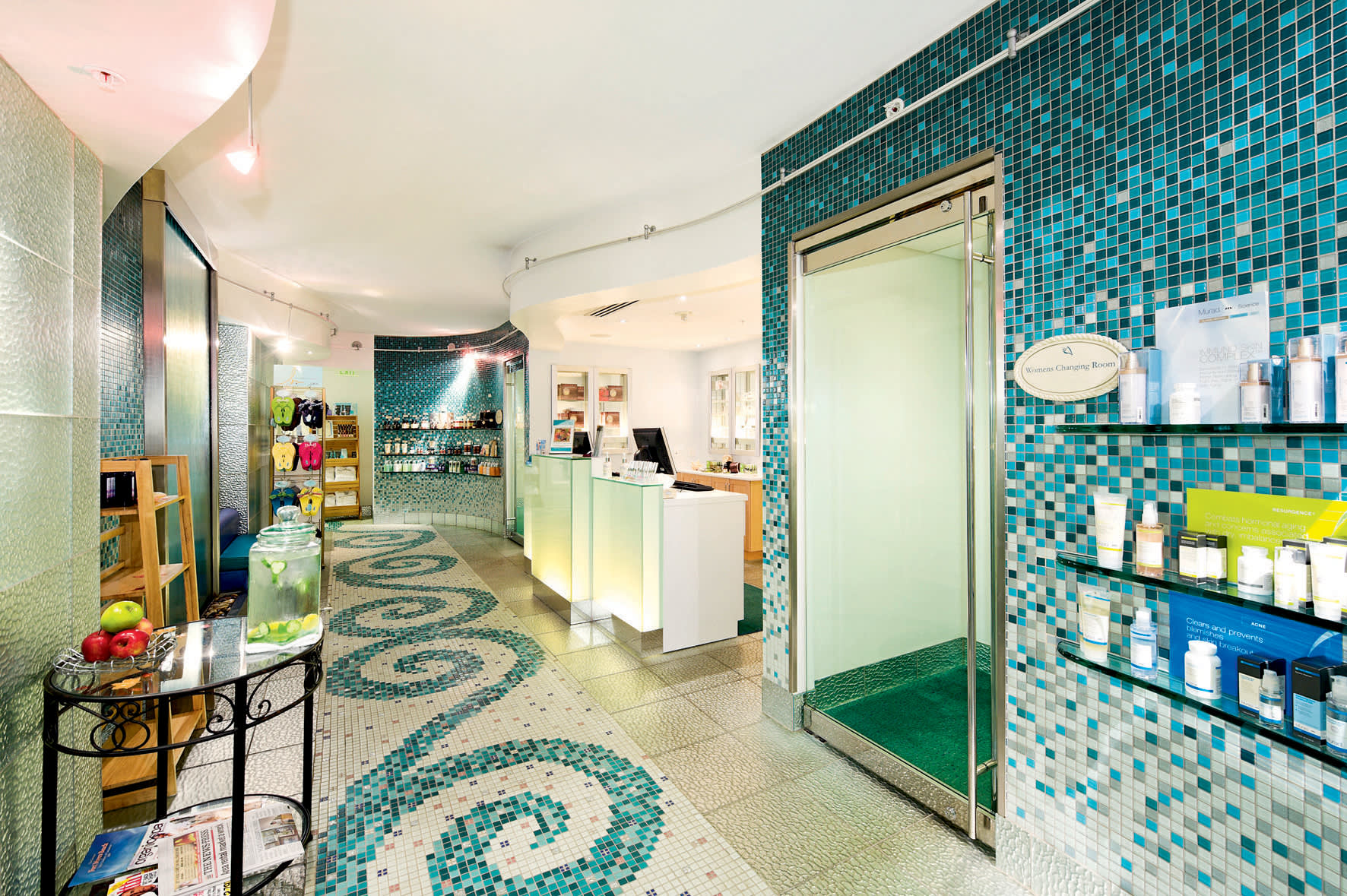 a white refrigerator freezer sitting in a room