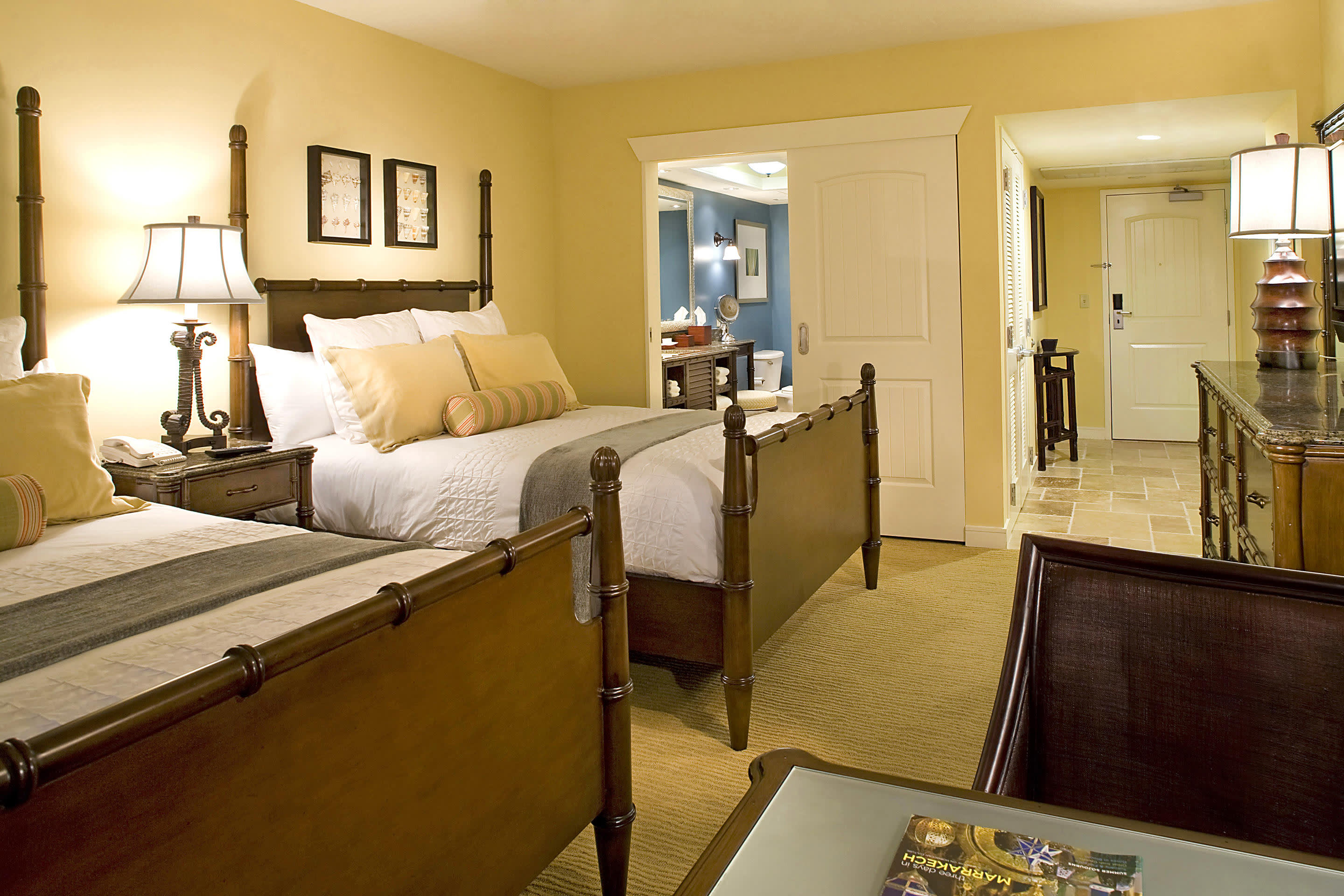 a bedroom with a large bed in a room